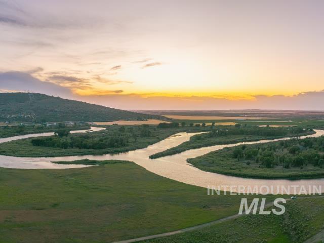 Surrounding community with a water and mountain view