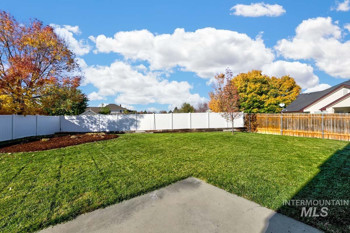 Fenced backyard featuring a patio area