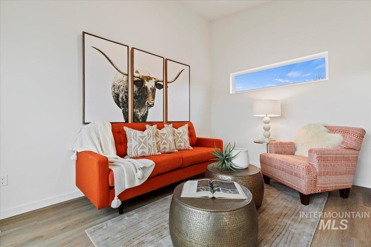 Living area with wood finished floors