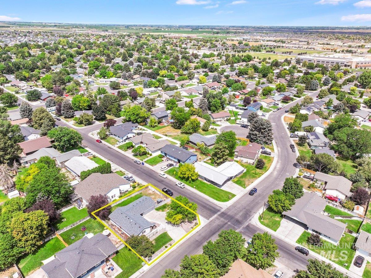 Aerial perspective of suburban area with property boundaries highlighted