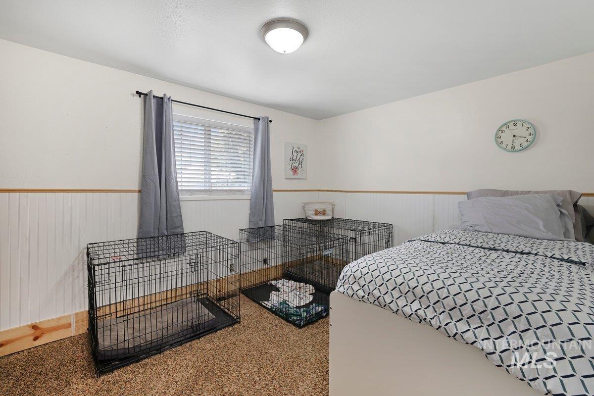 Bedroom with wainscoting