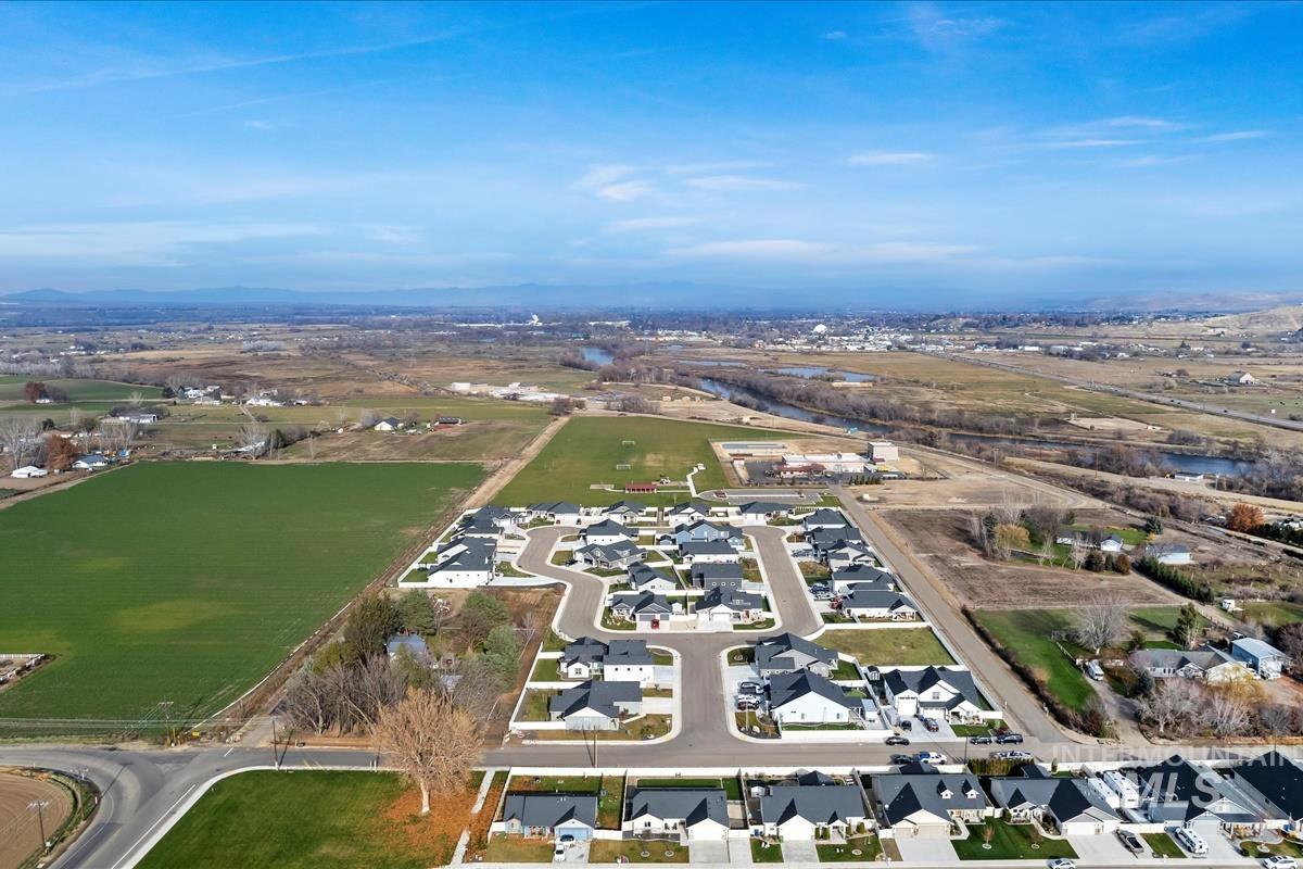 View of property location with nearby suburban area