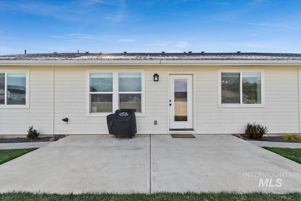 Back of house with a patio area