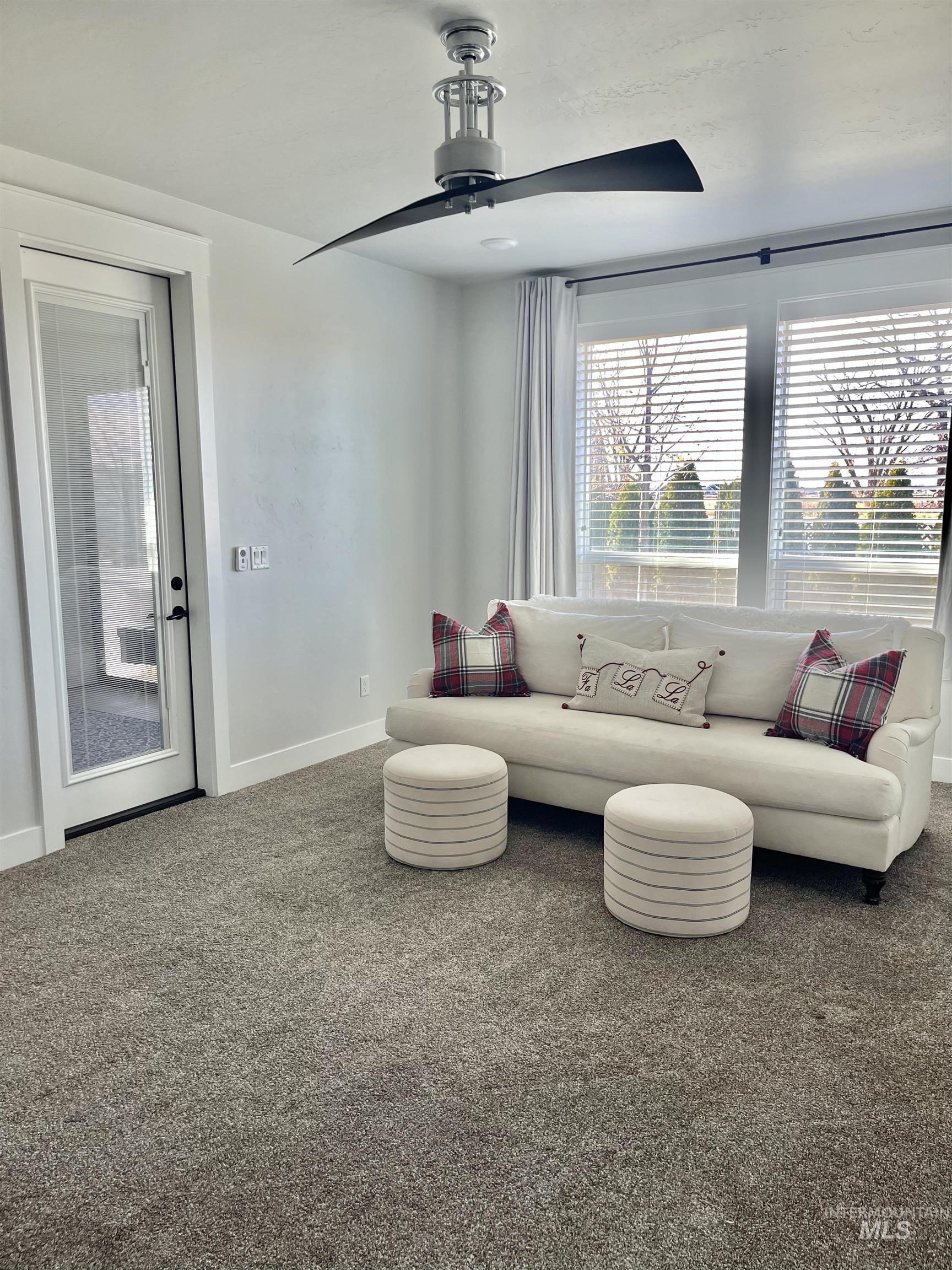 Sun Room? Living Room?  Office?  Take your pick. Room with custom fan just off the kitchen.