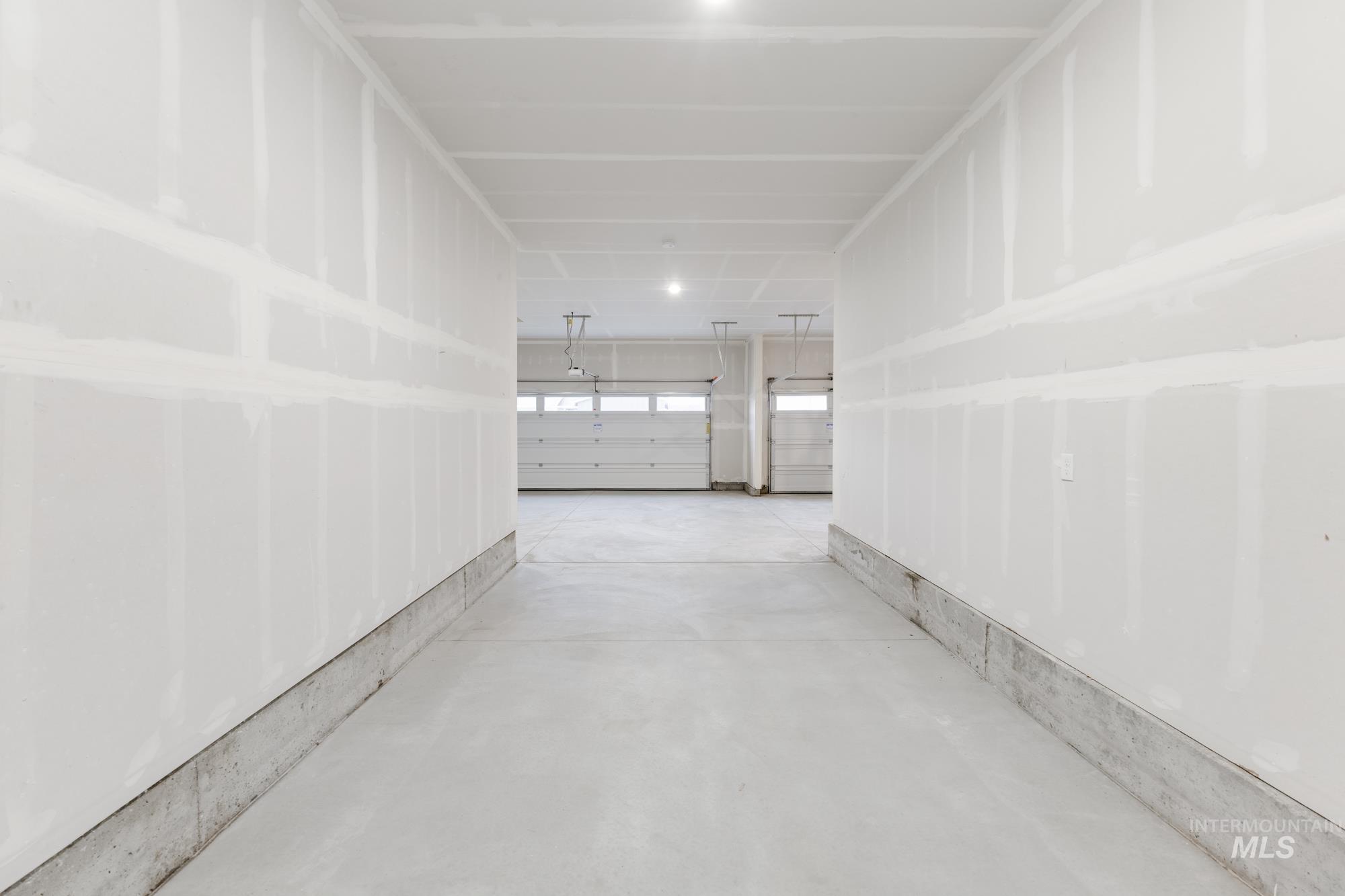 Hallway with concrete flooring