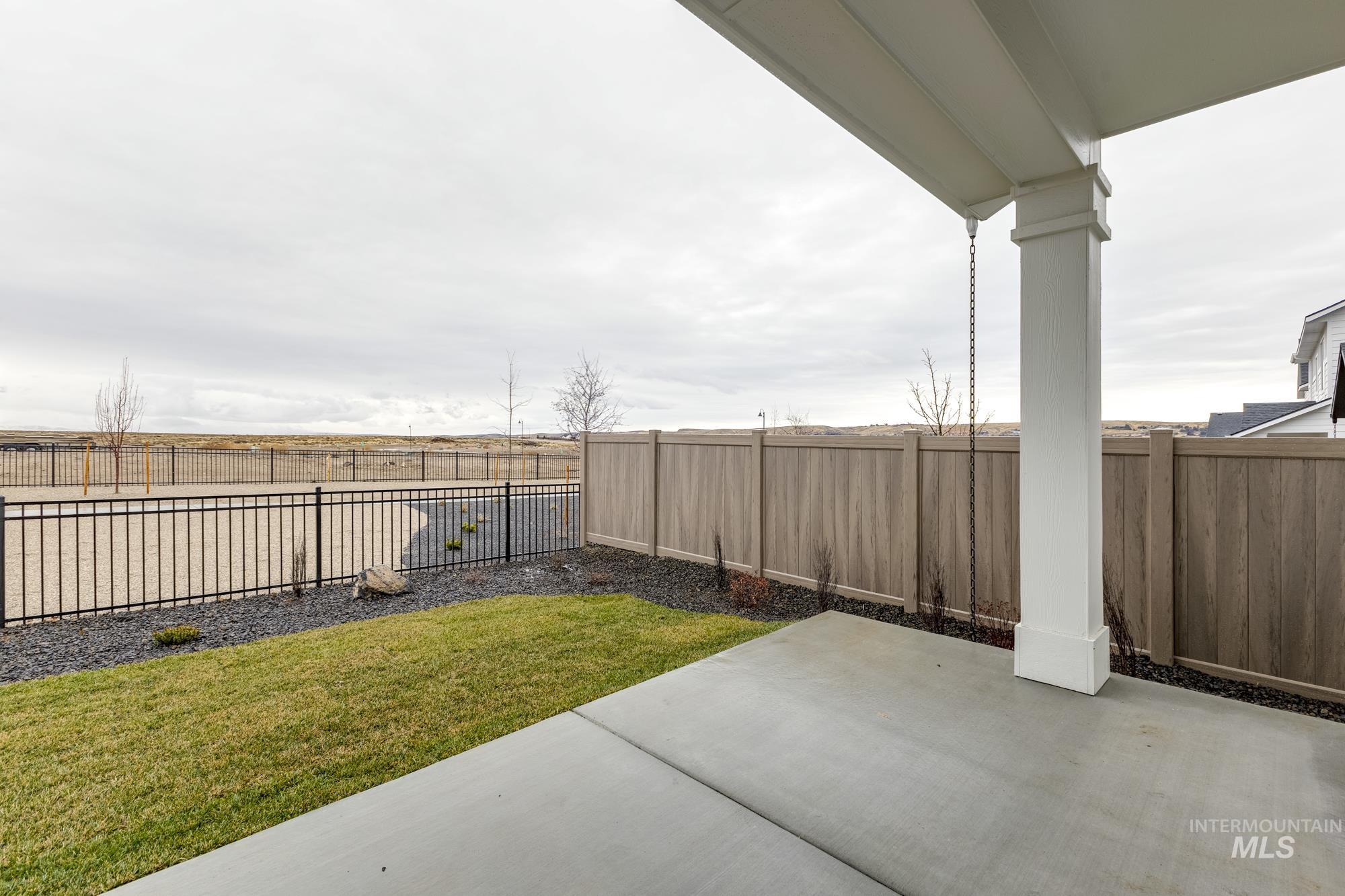 Fenced backyard featuring a patio area