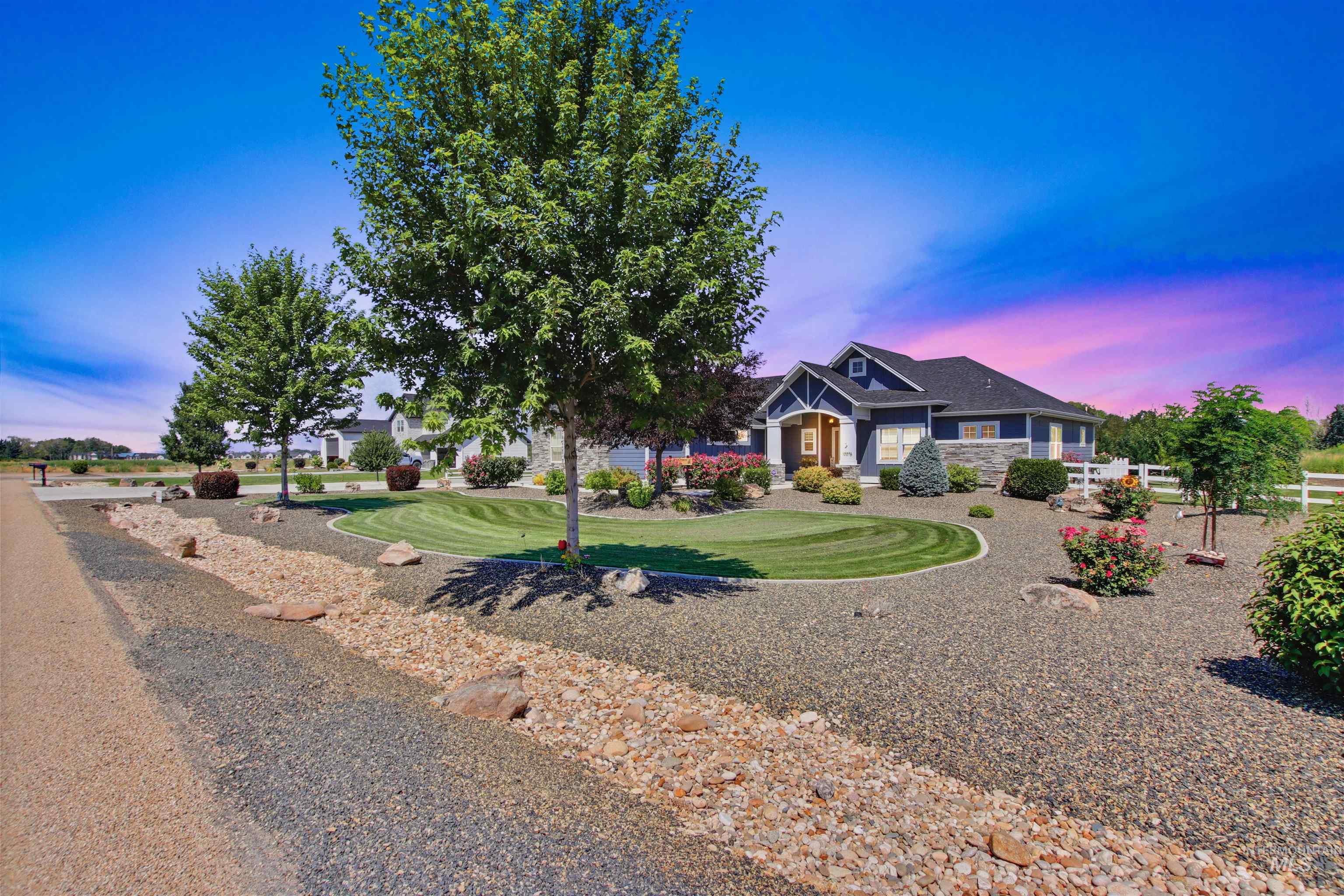 Craftsman-style home with a front yard