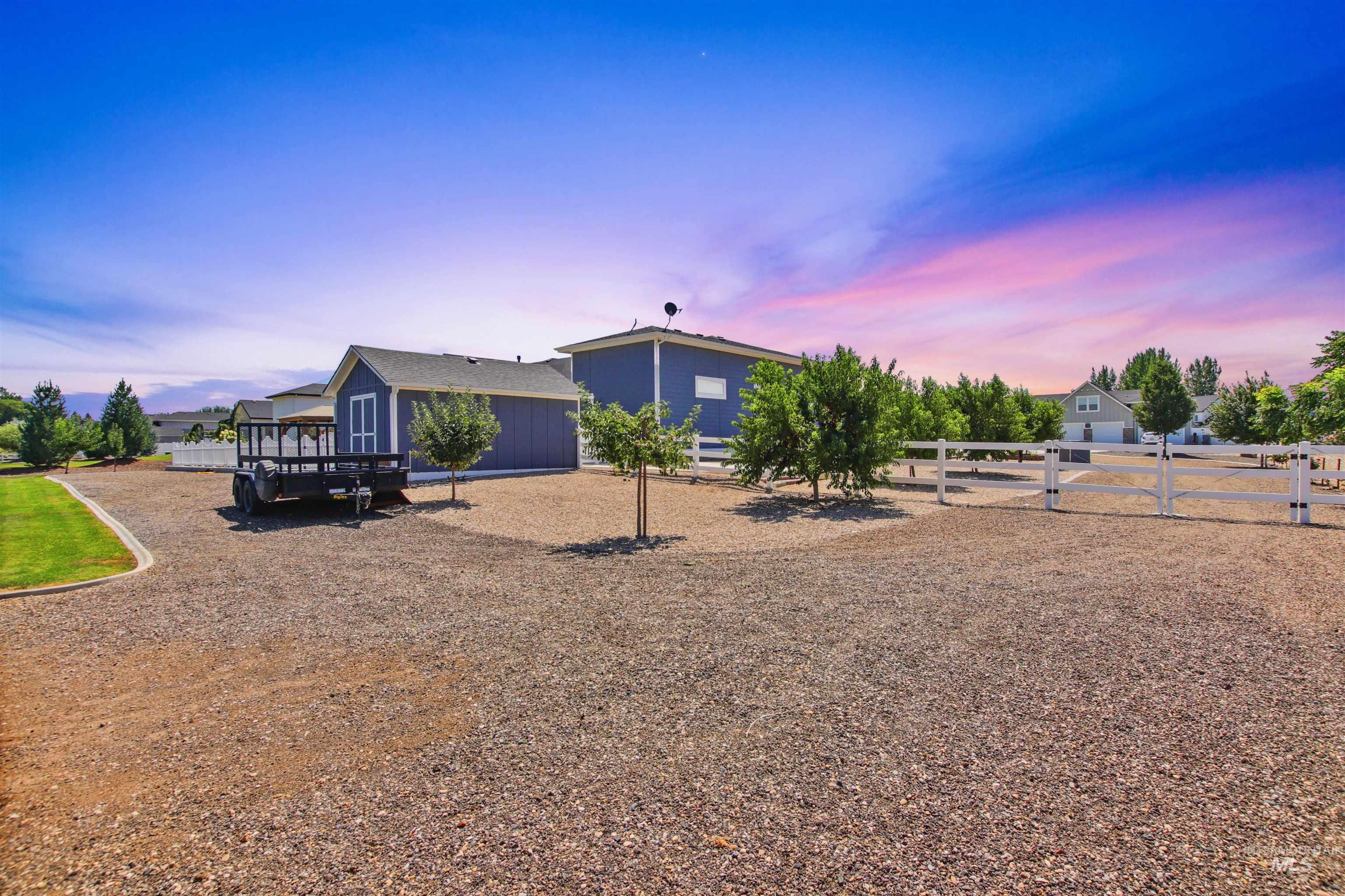 View of front of home featuring a wooden deck