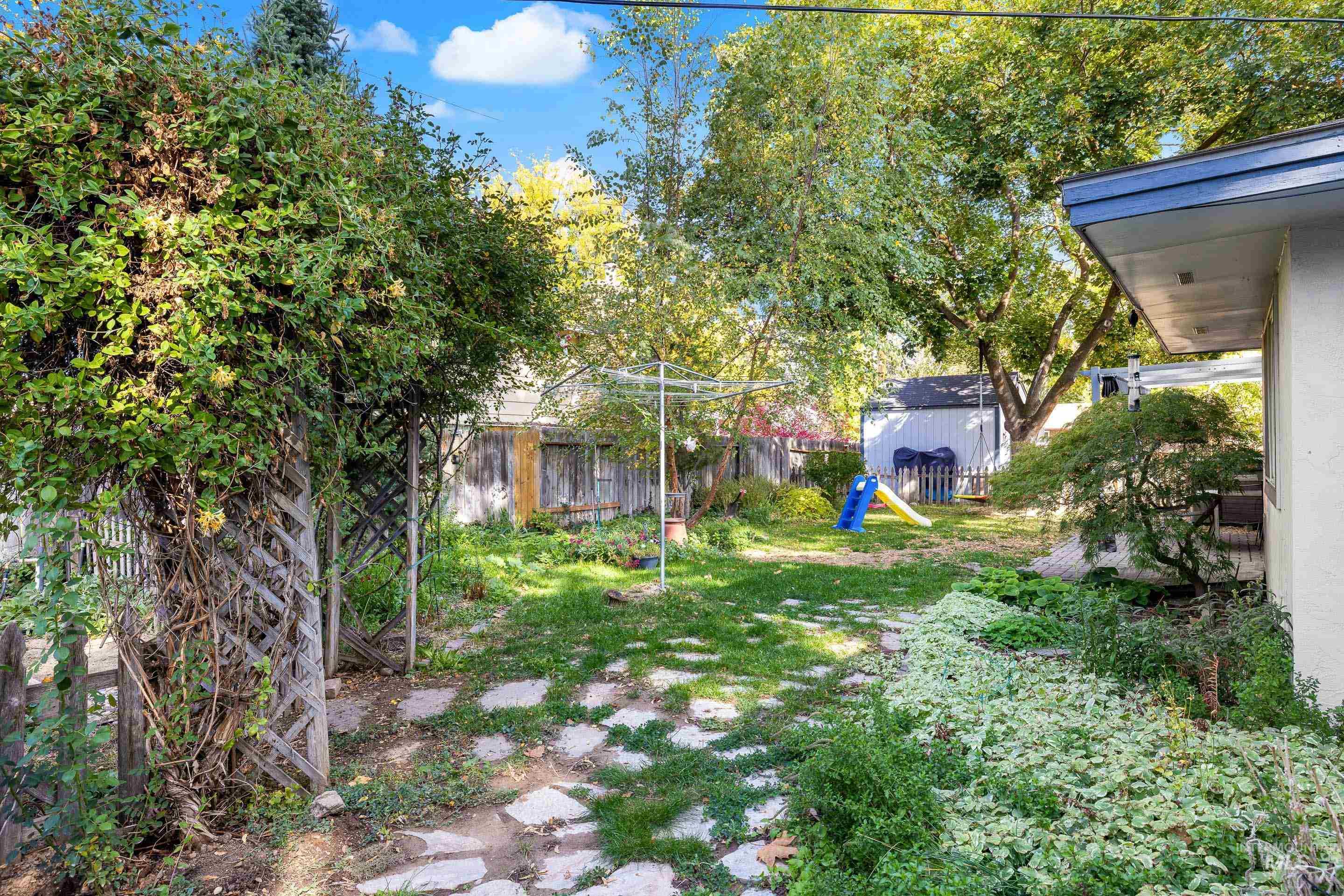 View of yard with a playground