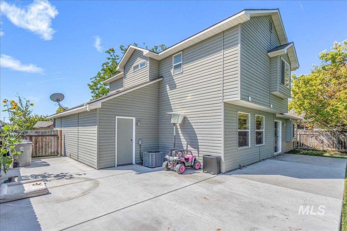 Back of property featuring a patio area