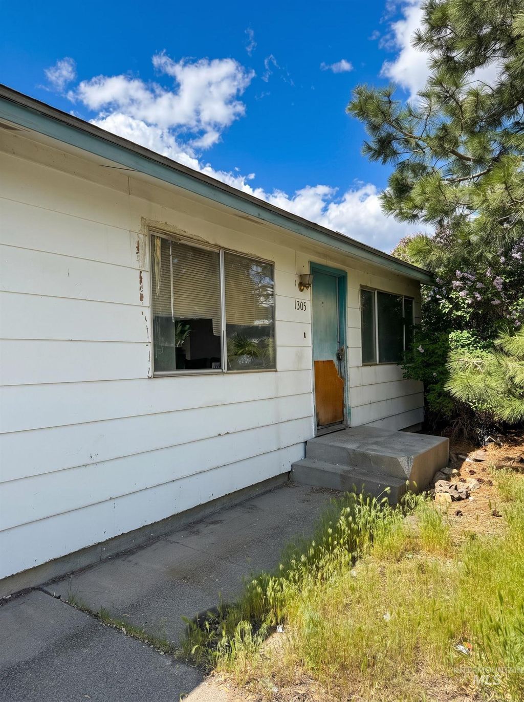 Photo of 1305 N 2nd E, Mountain Home, ID 83647 (MLS # 98985049)