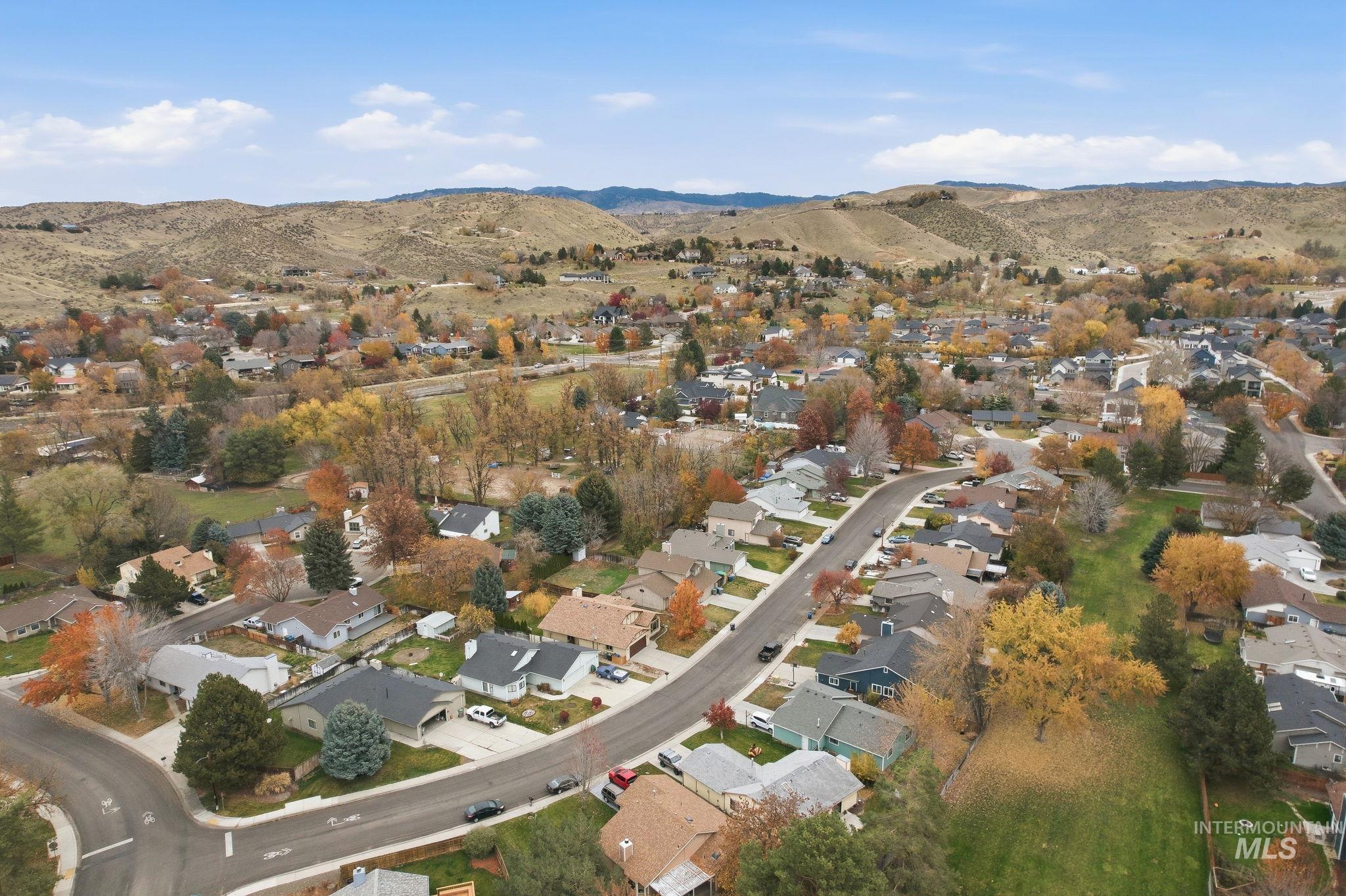 View of property location featuring nearby suburban area