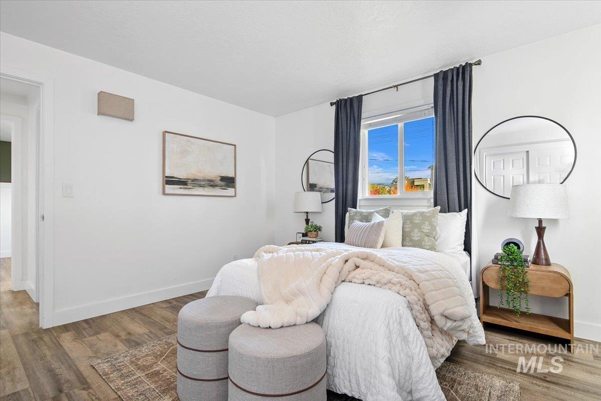 Bedroom featuring wood finished floors