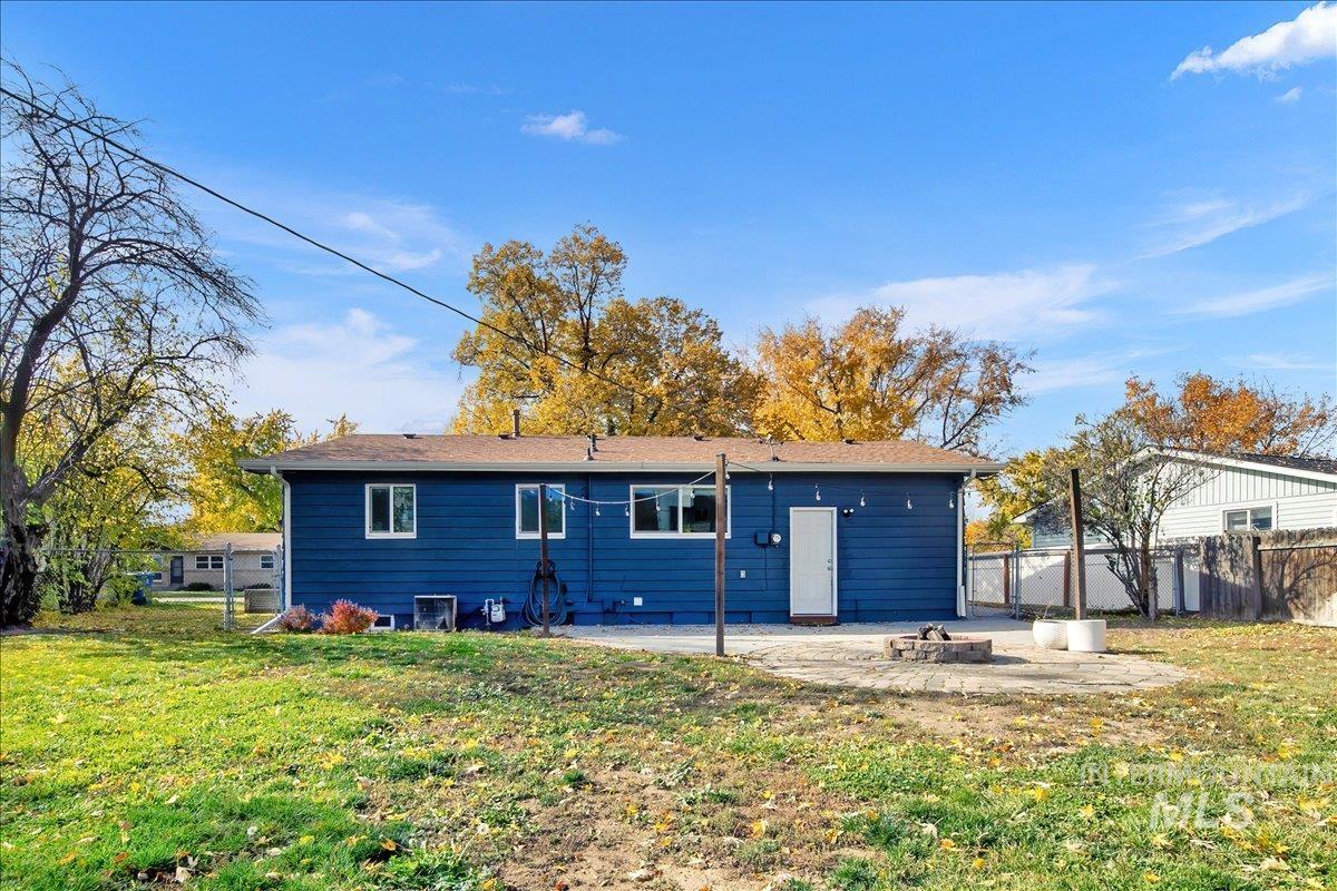 Rear view of property featuring a patio area