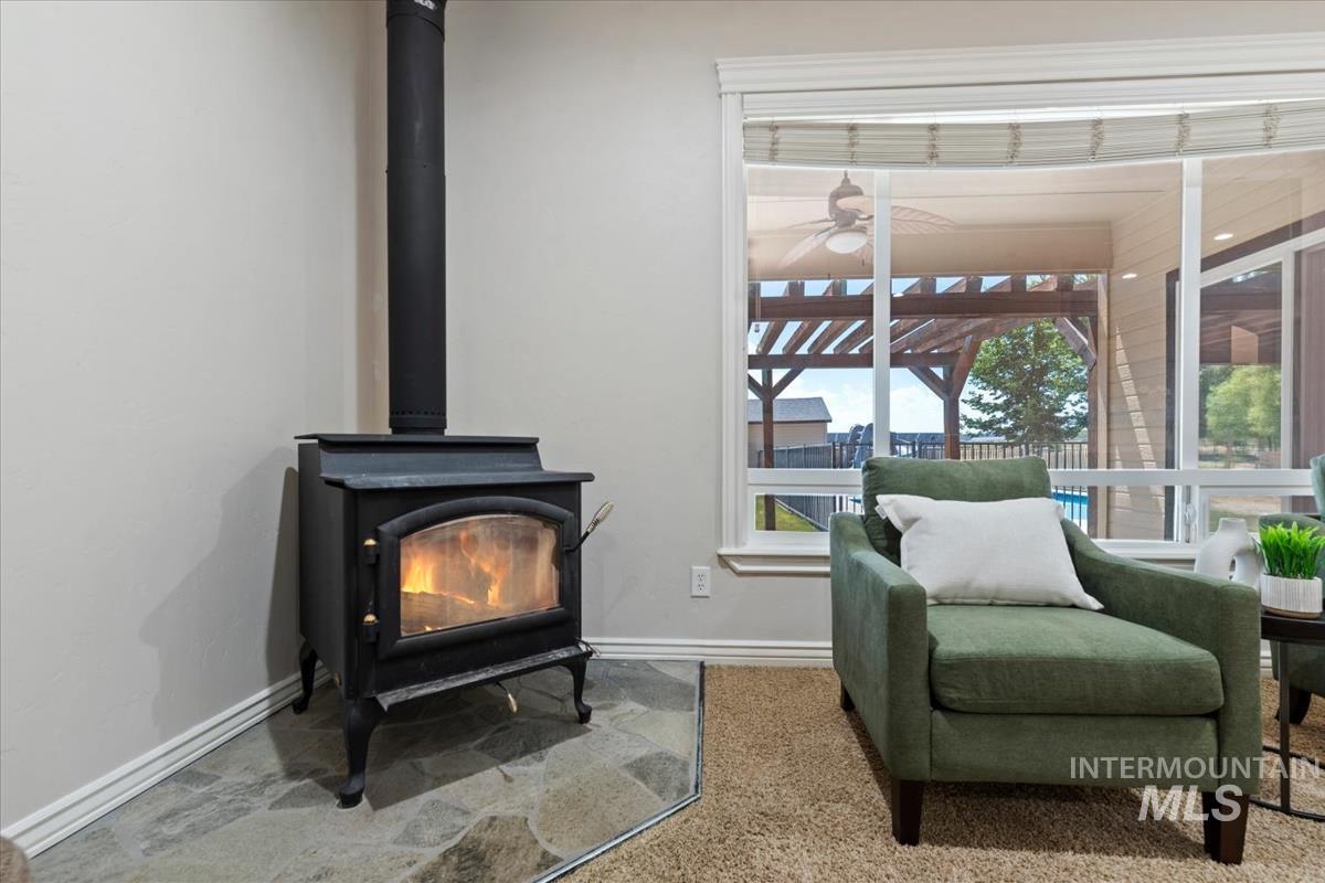 Corner wood-burning stove with a slate hearth