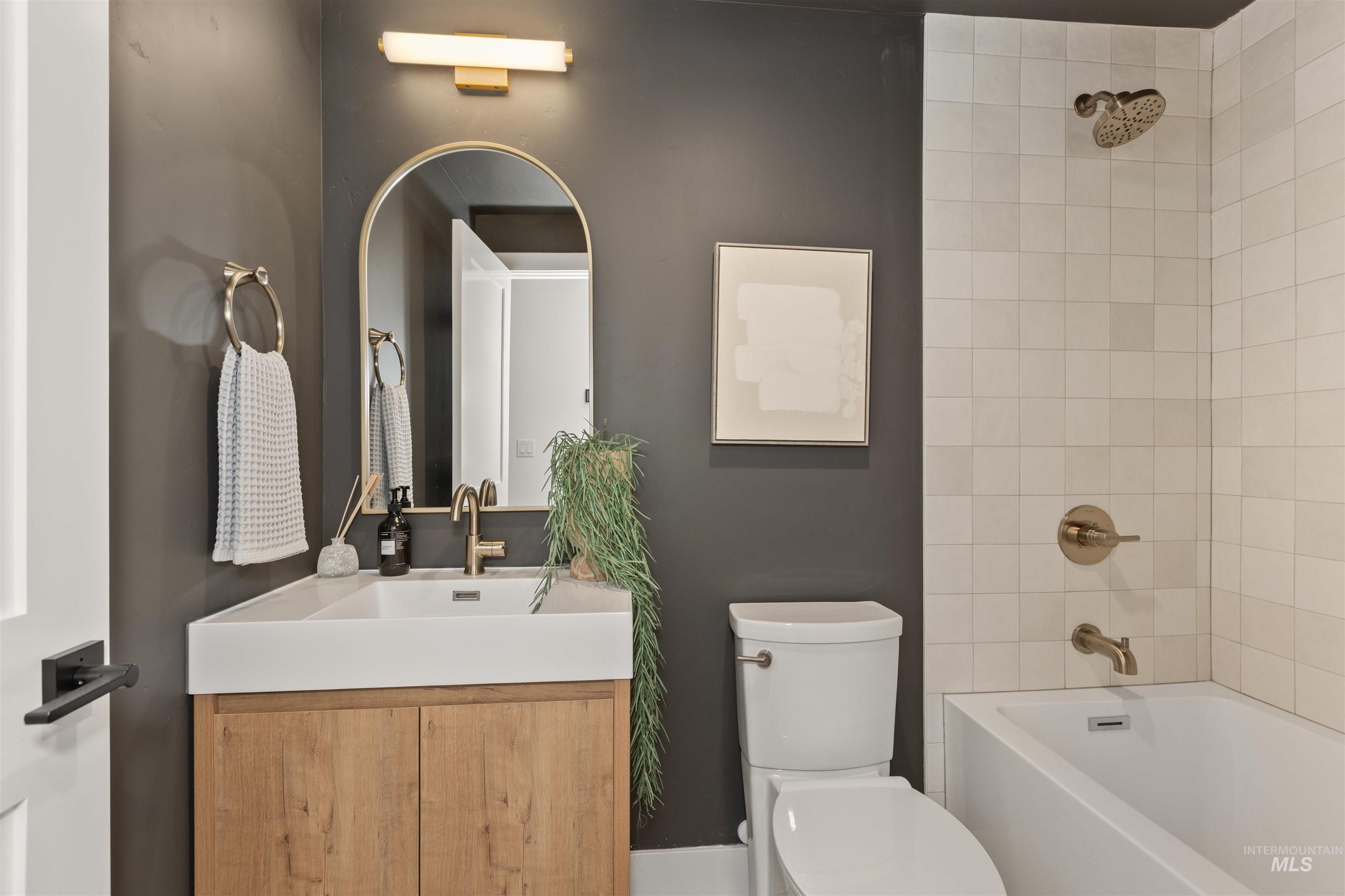 Full bath with tub / shower combination and vanity