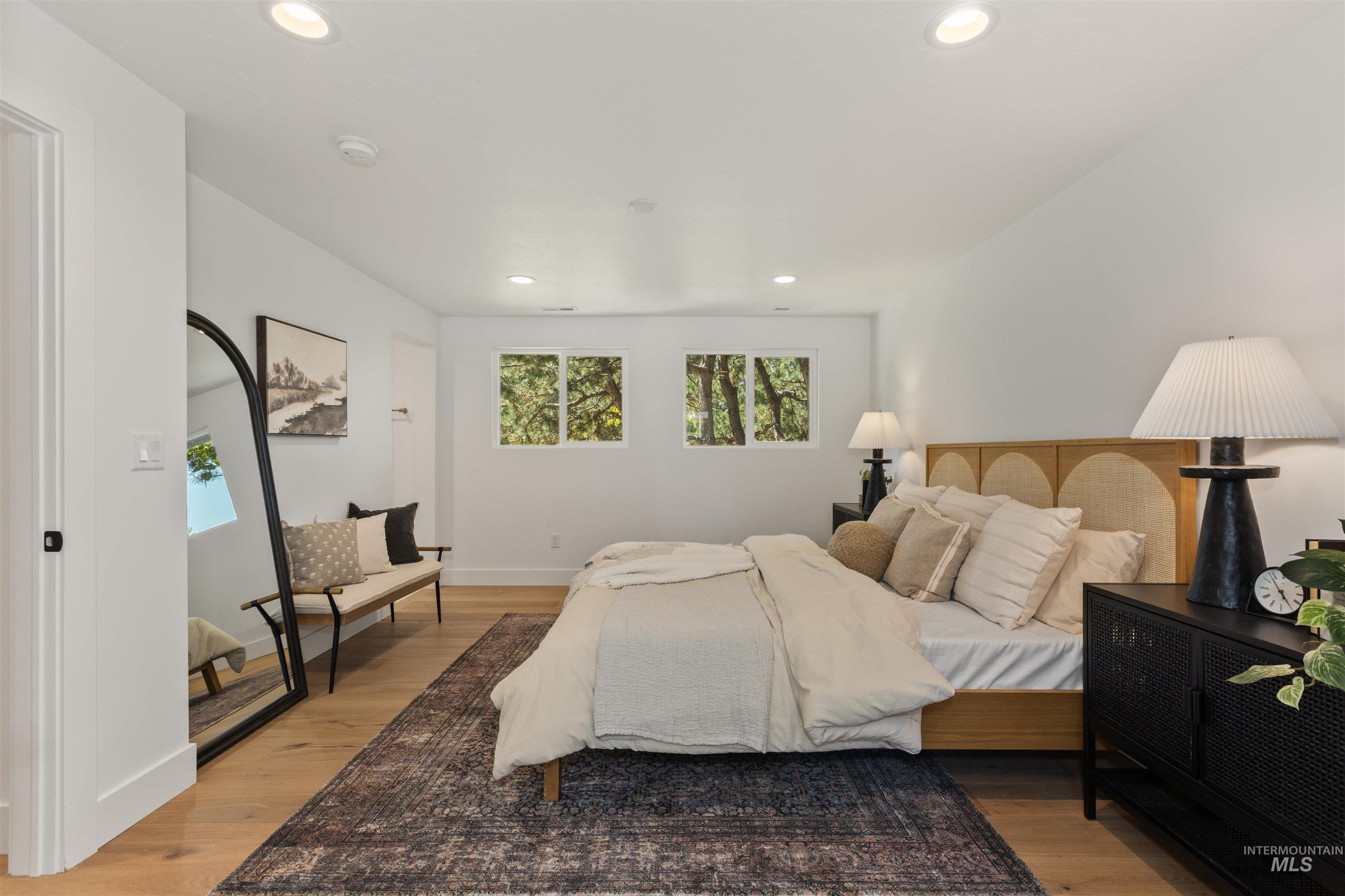 Bedroom featuring recessed lighting and light wood finished floors