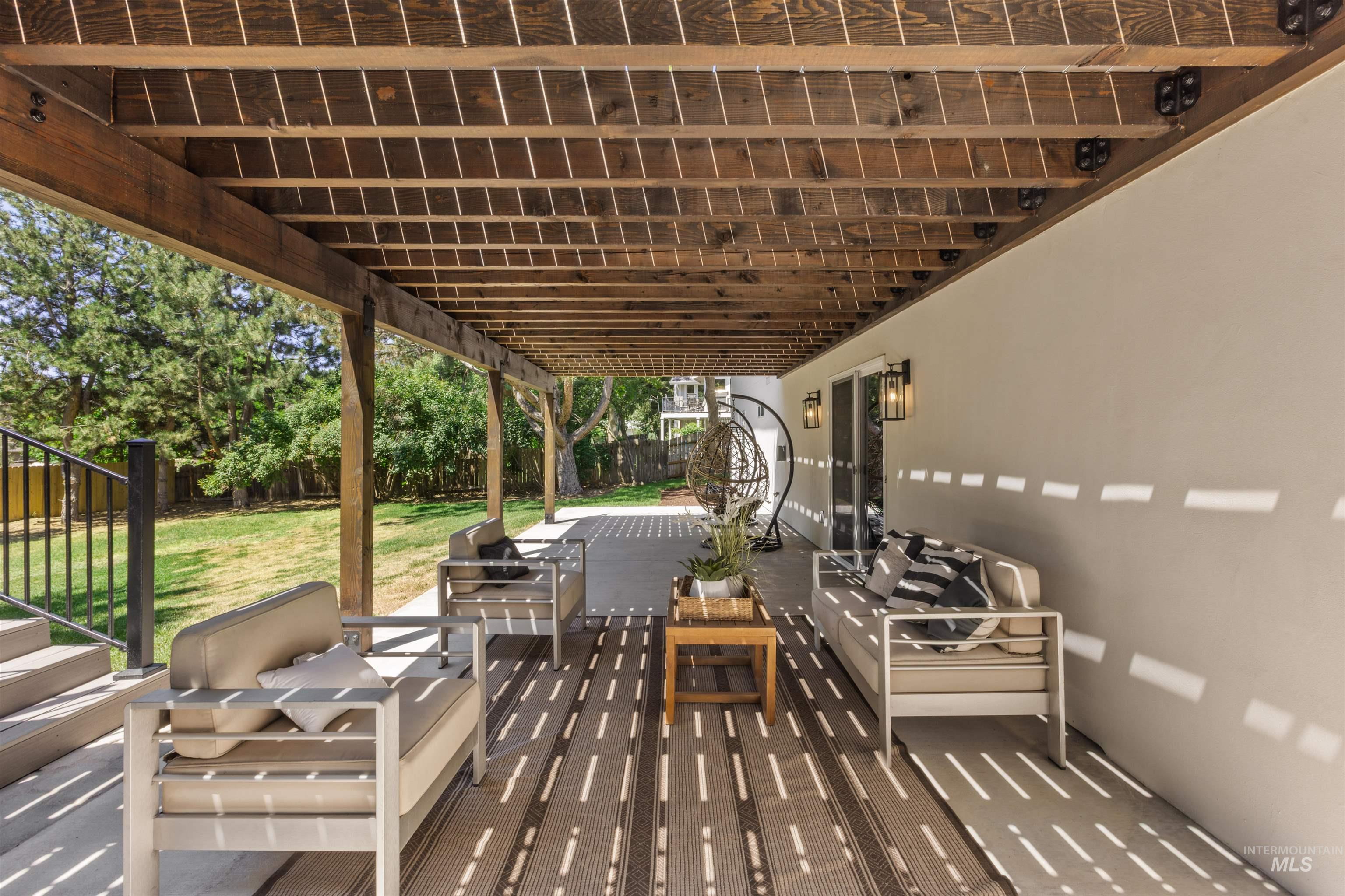 Fenced backyard featuring outdoor lounge area and a patio area