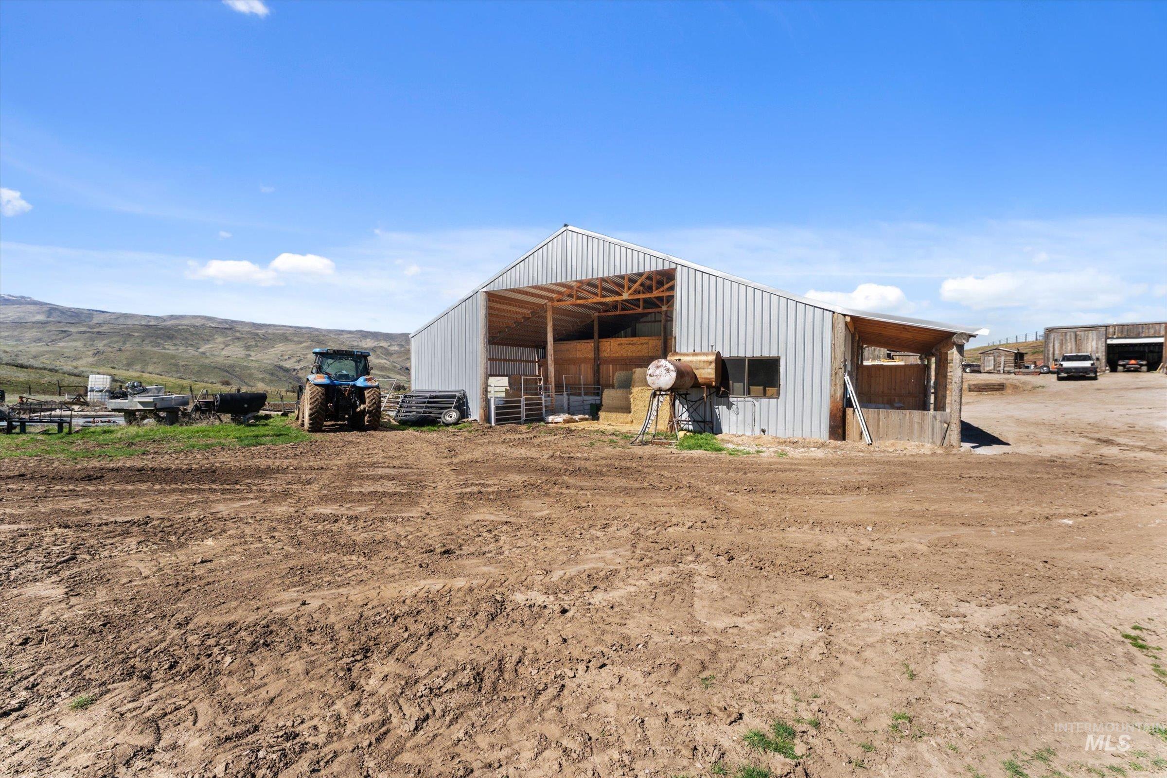 View of outbuilding featuring a mountain view