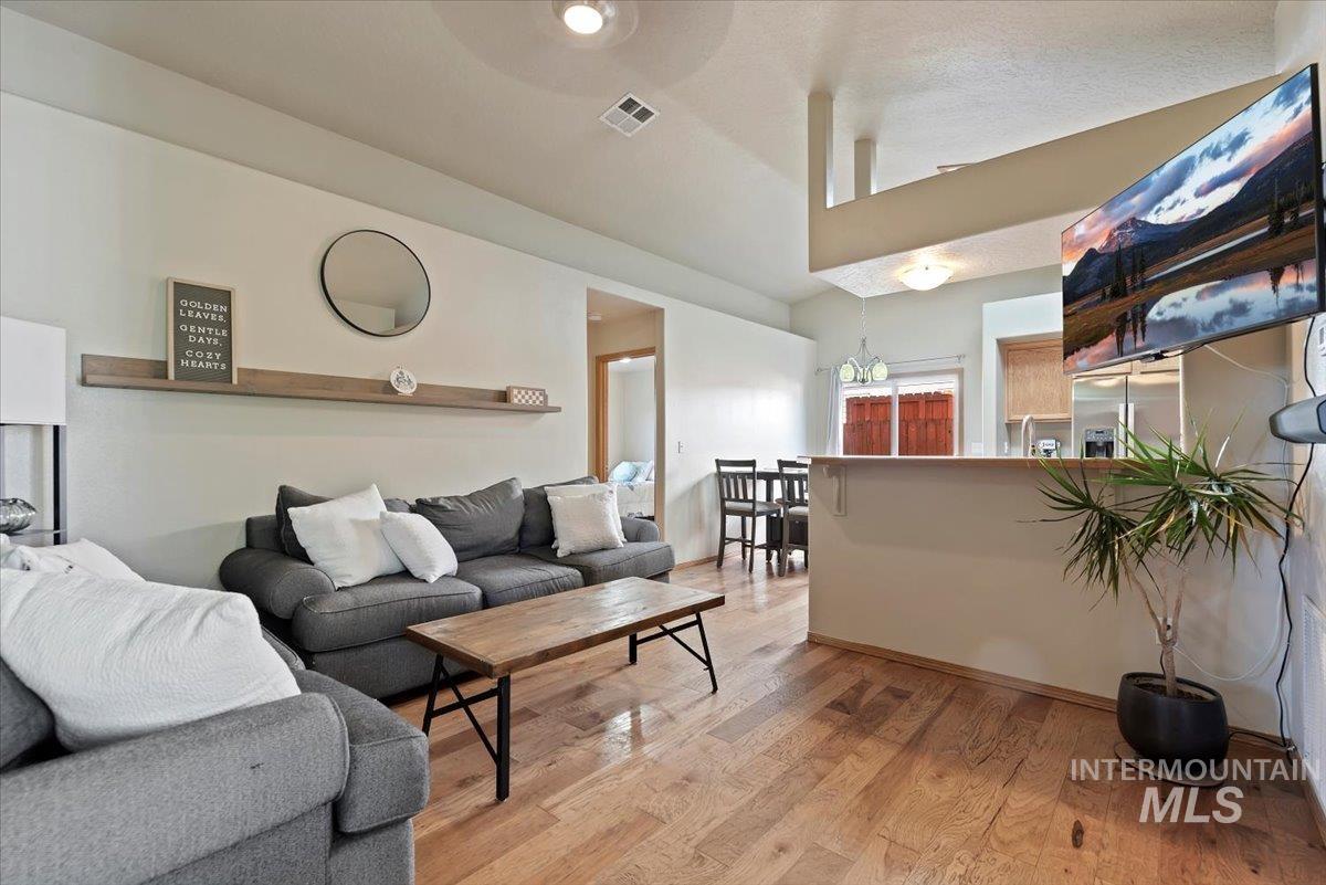 Living area with light wood-style flooring