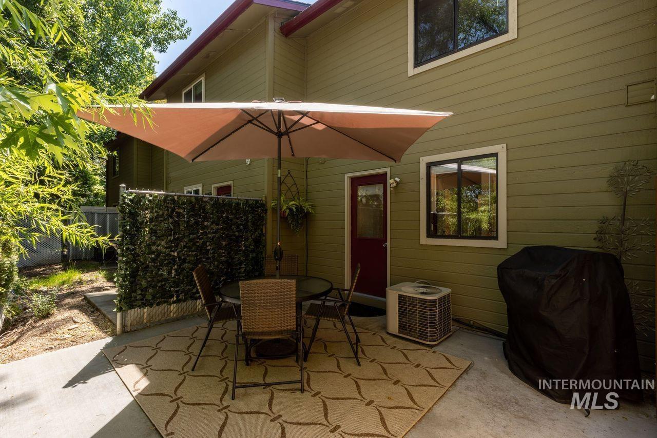 View of patio / terrace featuring a grill and outdoor dining space