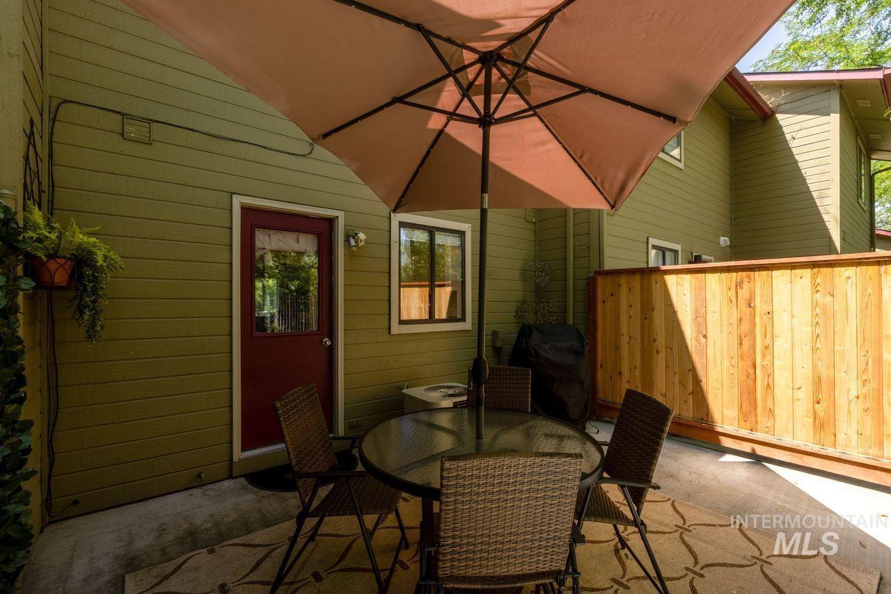 View of patio with outdoor dining space