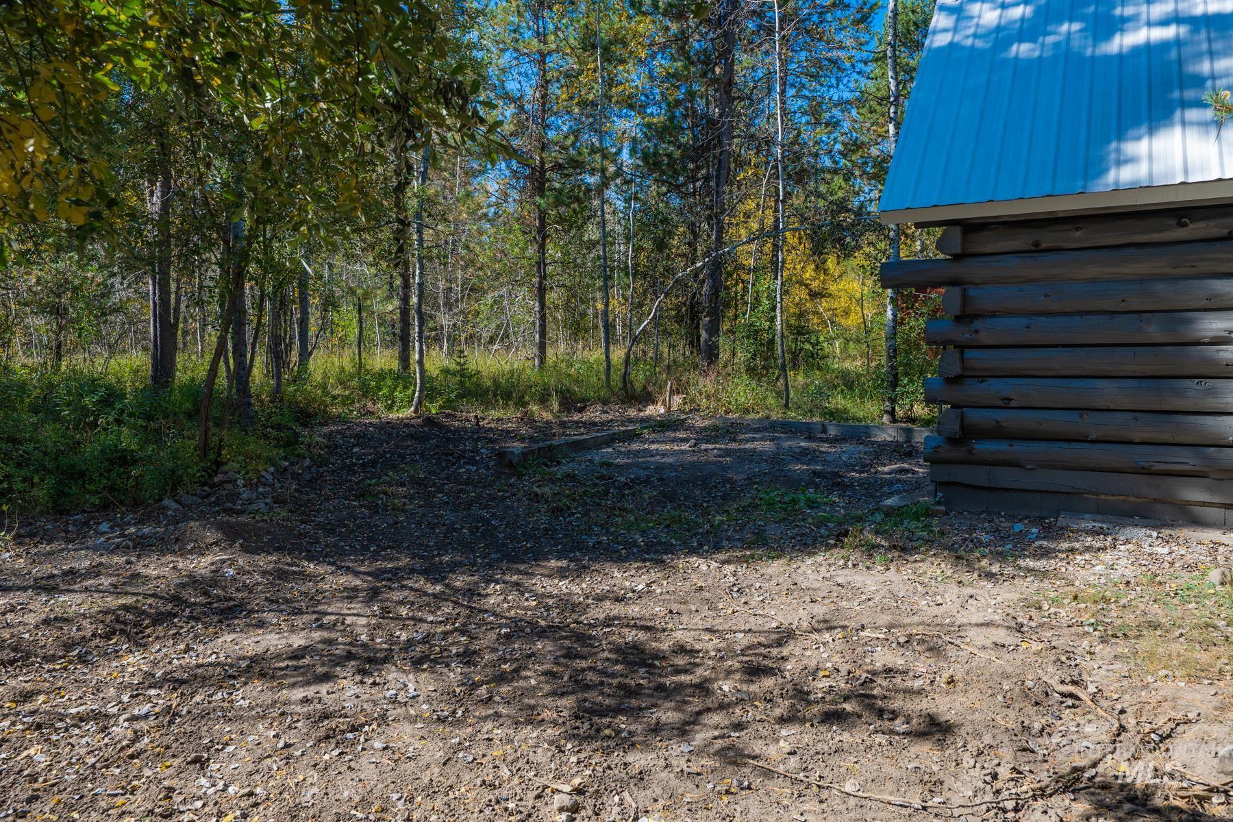 View of yard featuring a wooded view