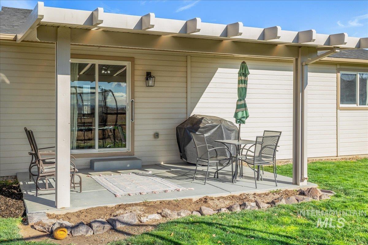 Rear view of house with a patio area