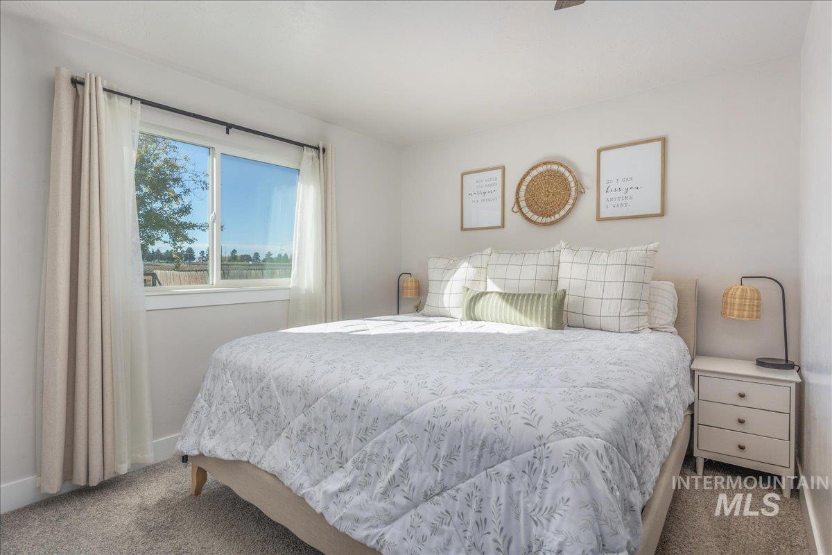Bedroom with carpet flooring