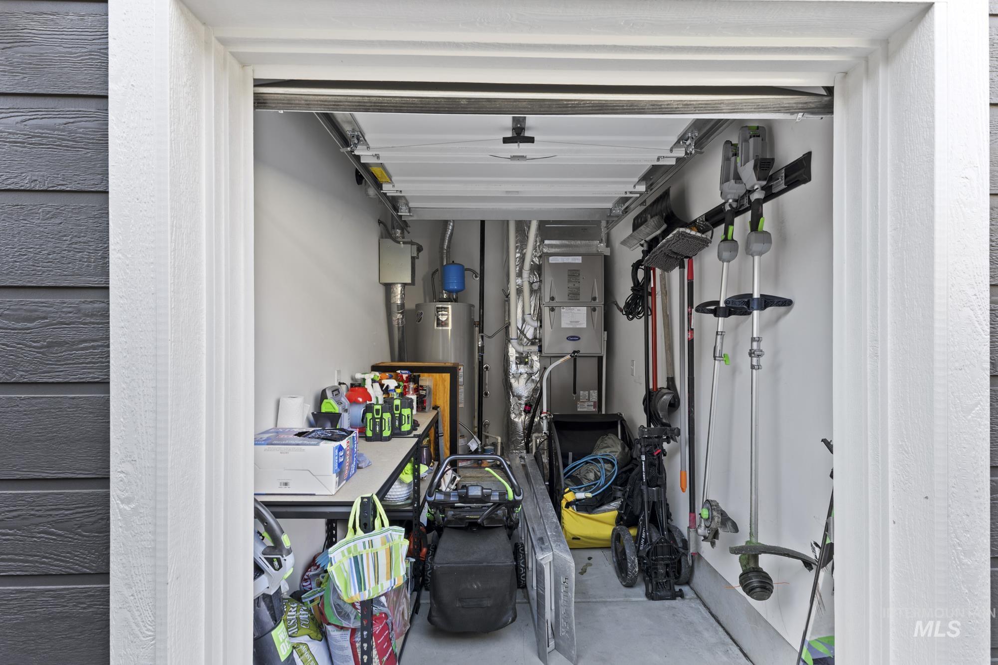 Garage with water heater and heating unit