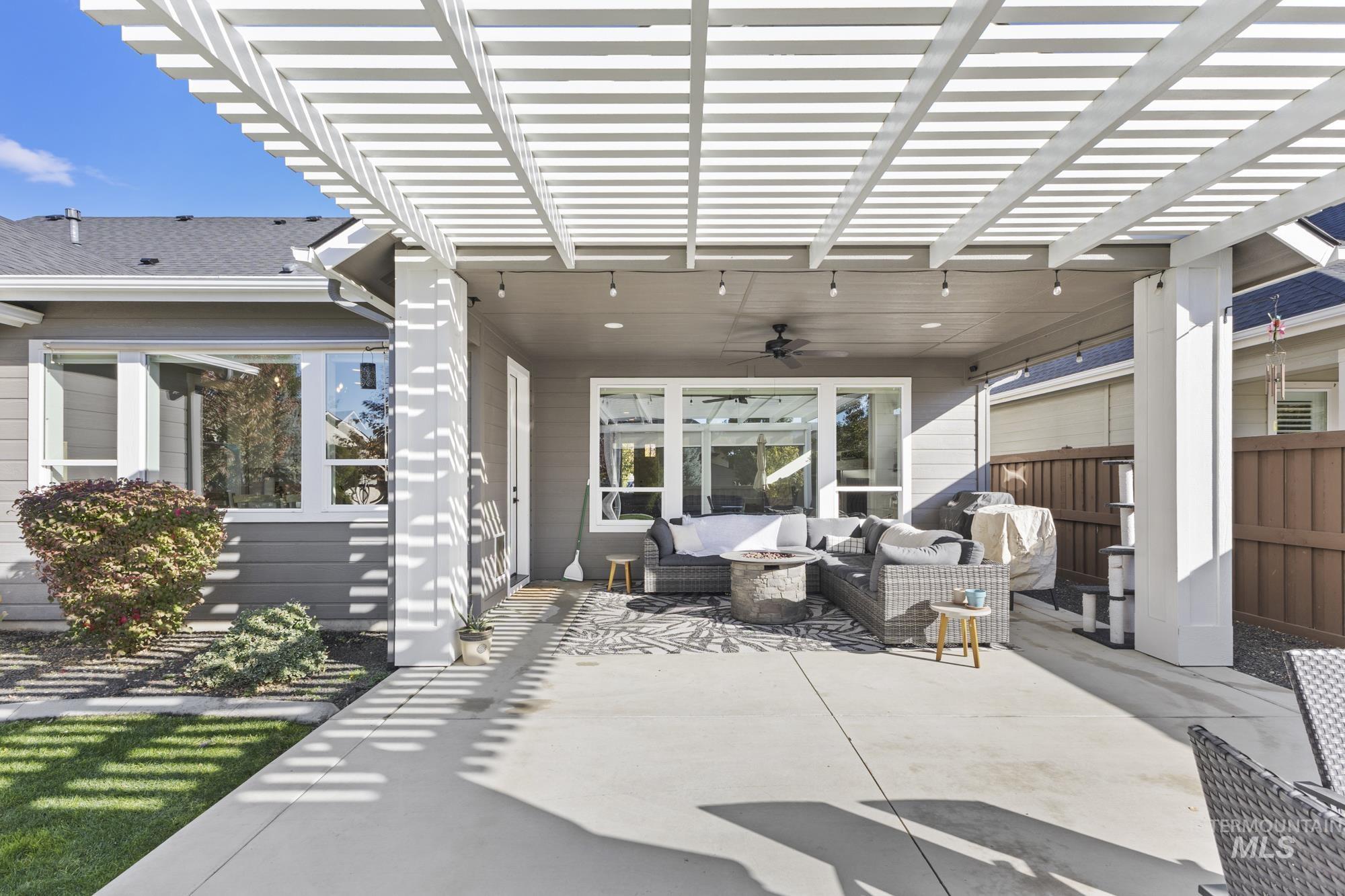 View of patio / terrace featuring an outdoor living space and ceiling fan