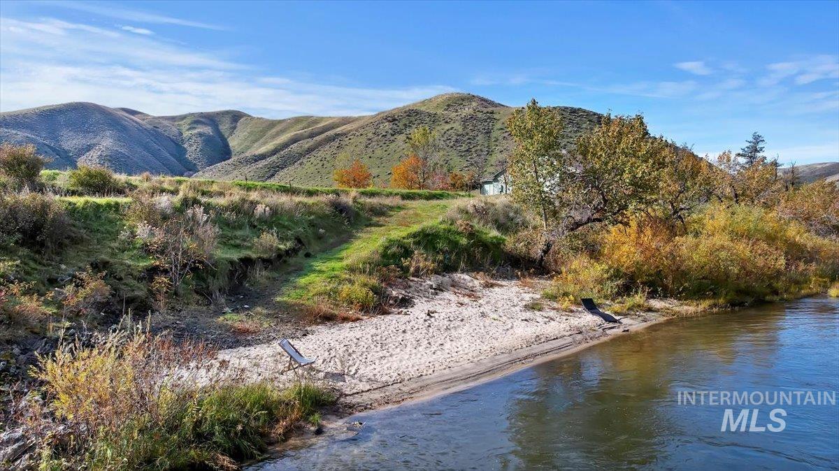 Mountain view featuring a large body of water