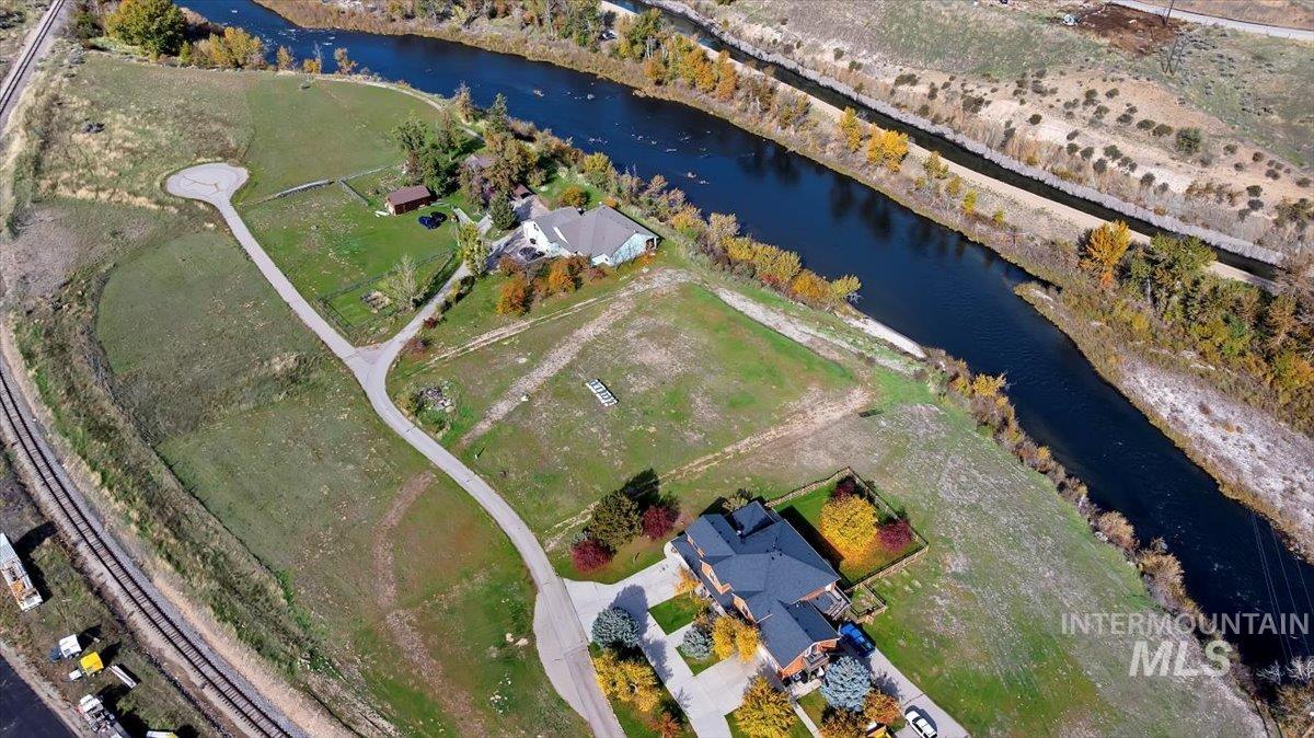 Aerial overview of property's location featuring a large body of water
