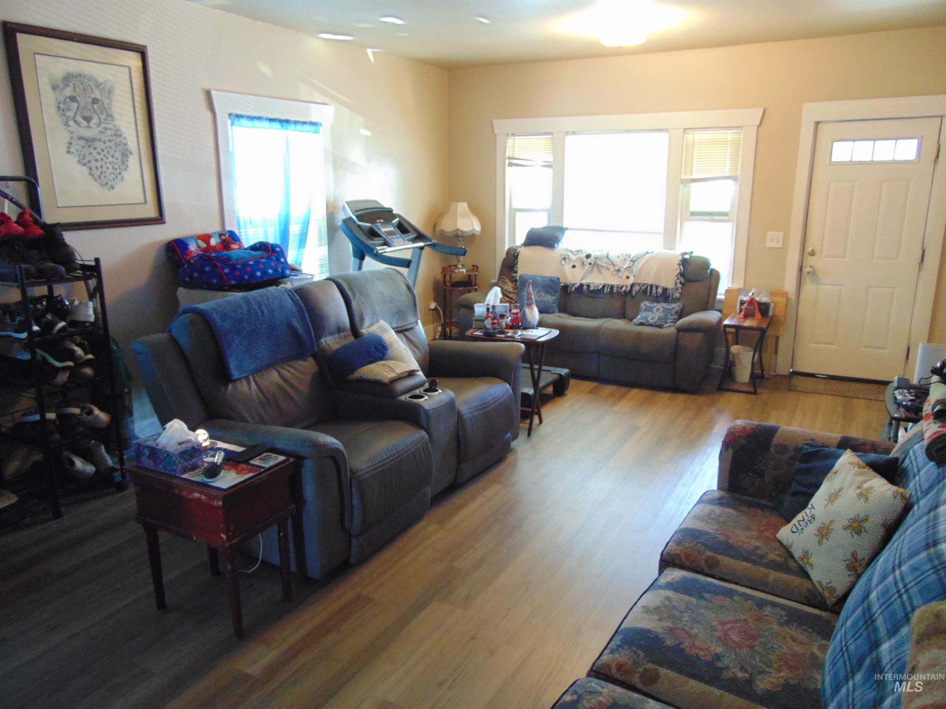 Living area with wood finished floors