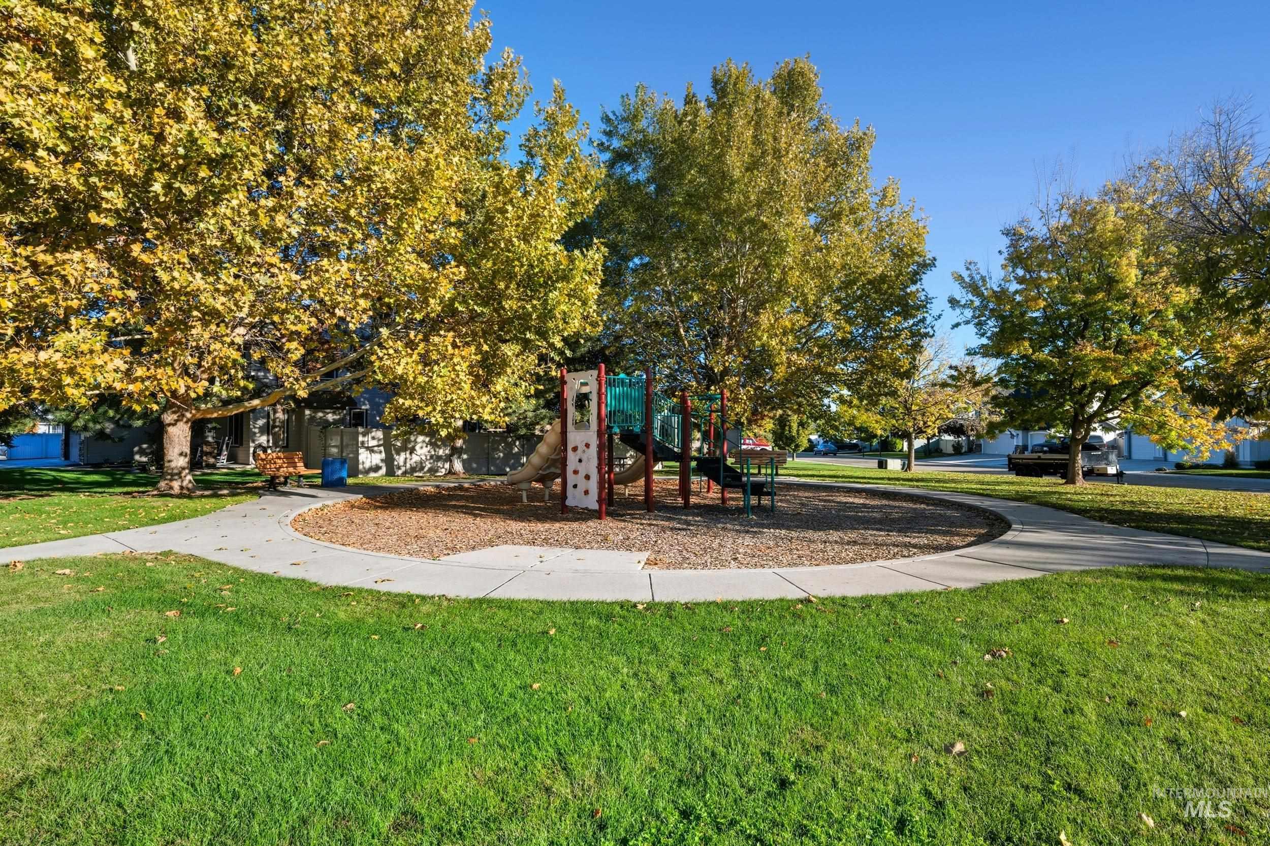 Community playground with a yard