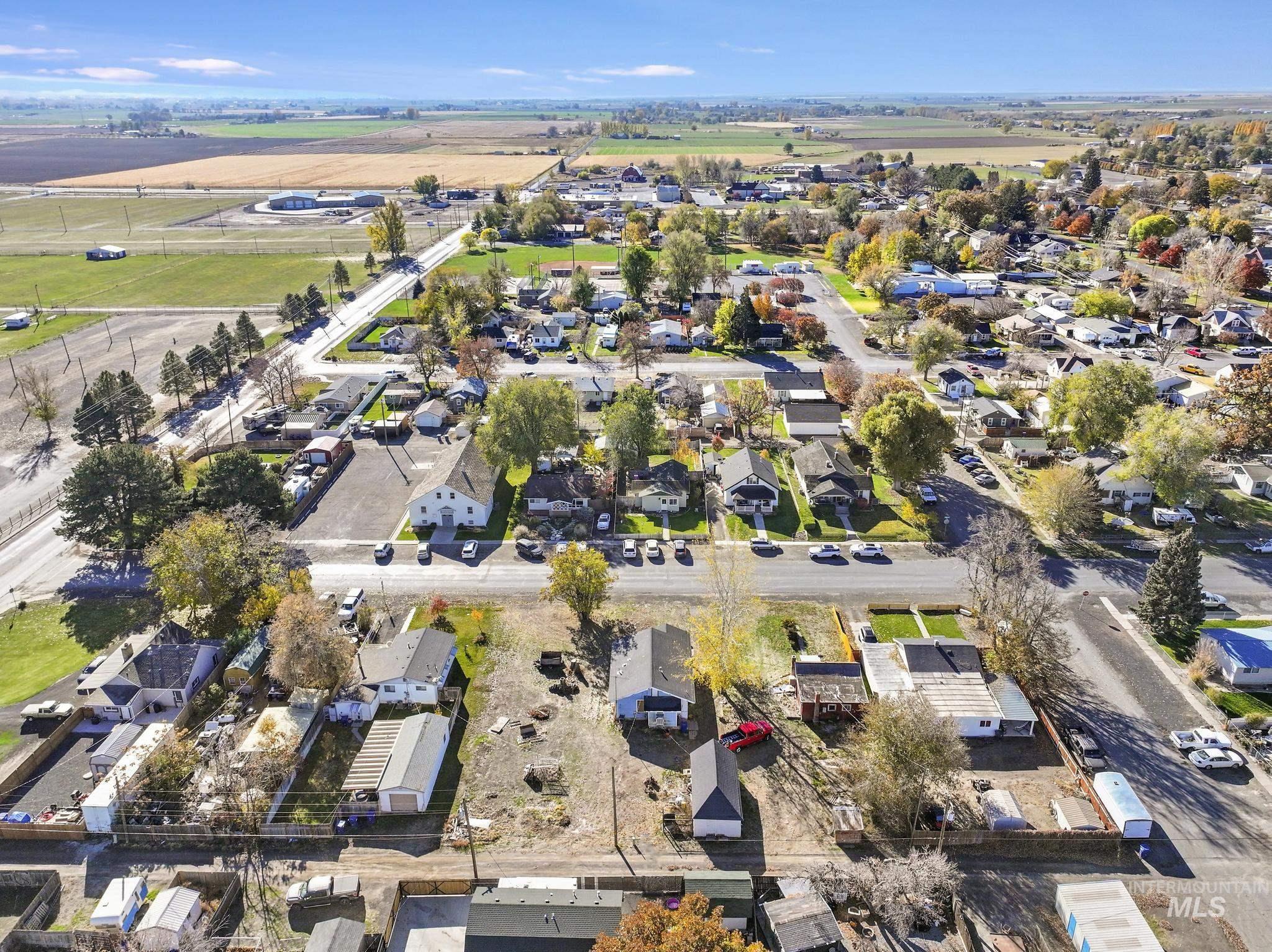 Aerial overview of property's location with nearby suburban area