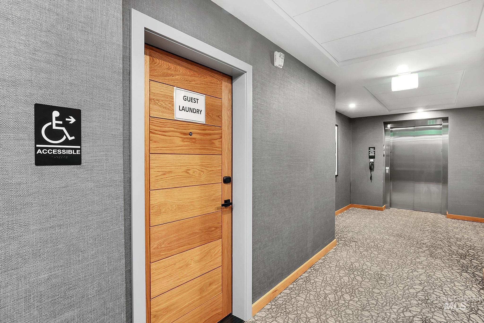Corridor with elevator and baseboards