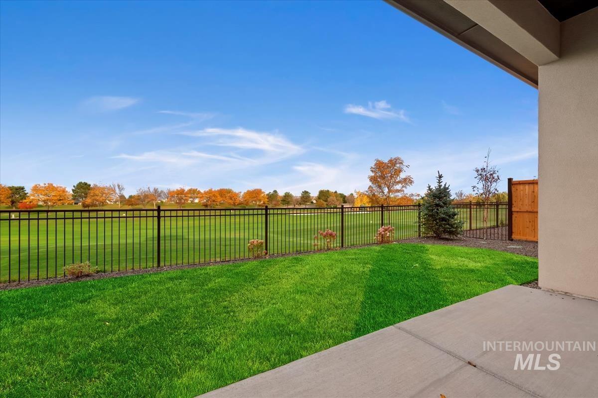 Fenced backyard featuring a patio