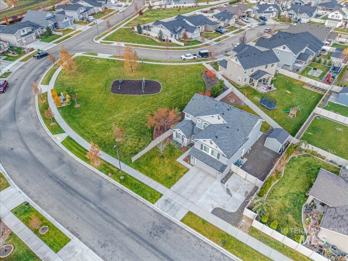 Aerial view of property's location featuring nearby suburban area