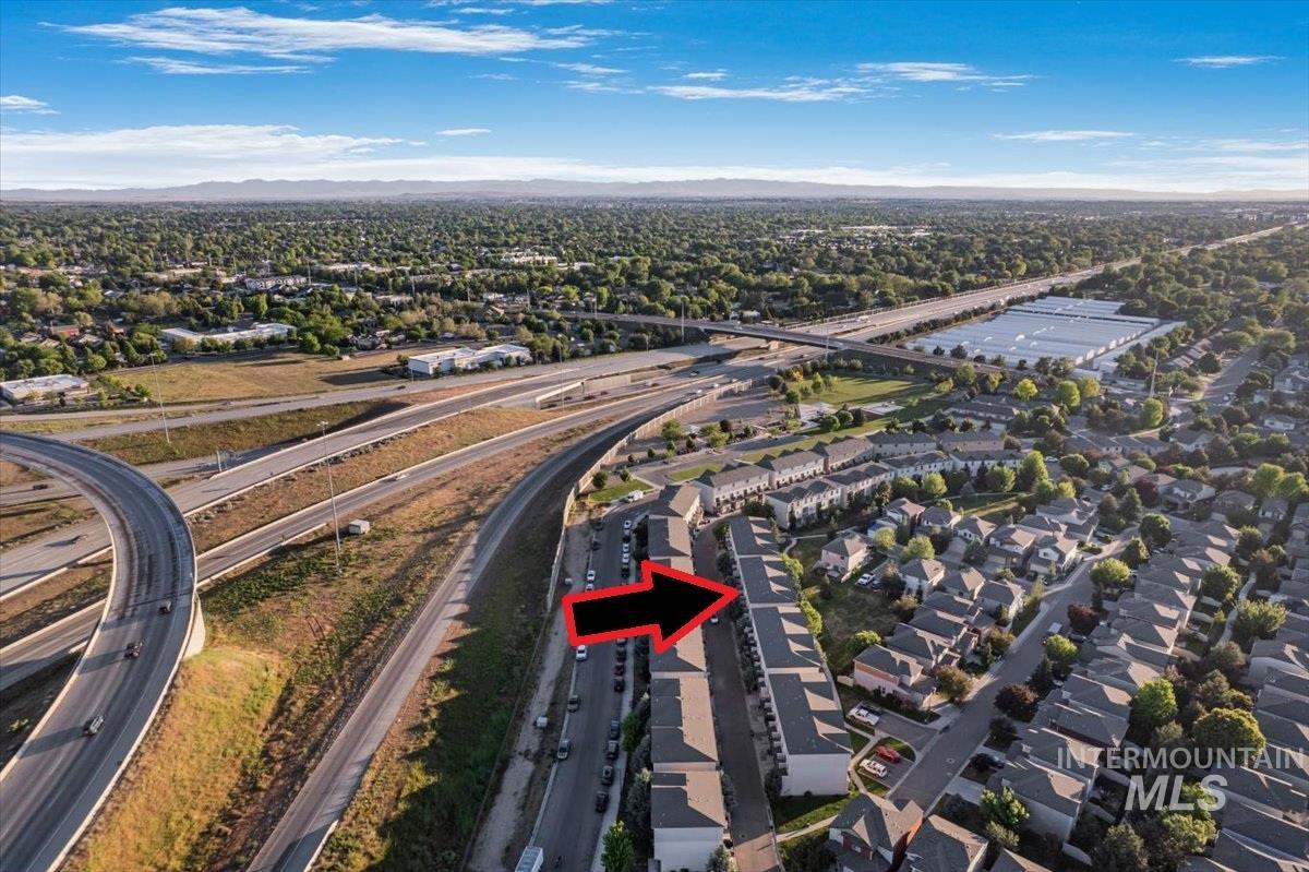 Aerial perspective showcasing the property within a structured neighborhood setting