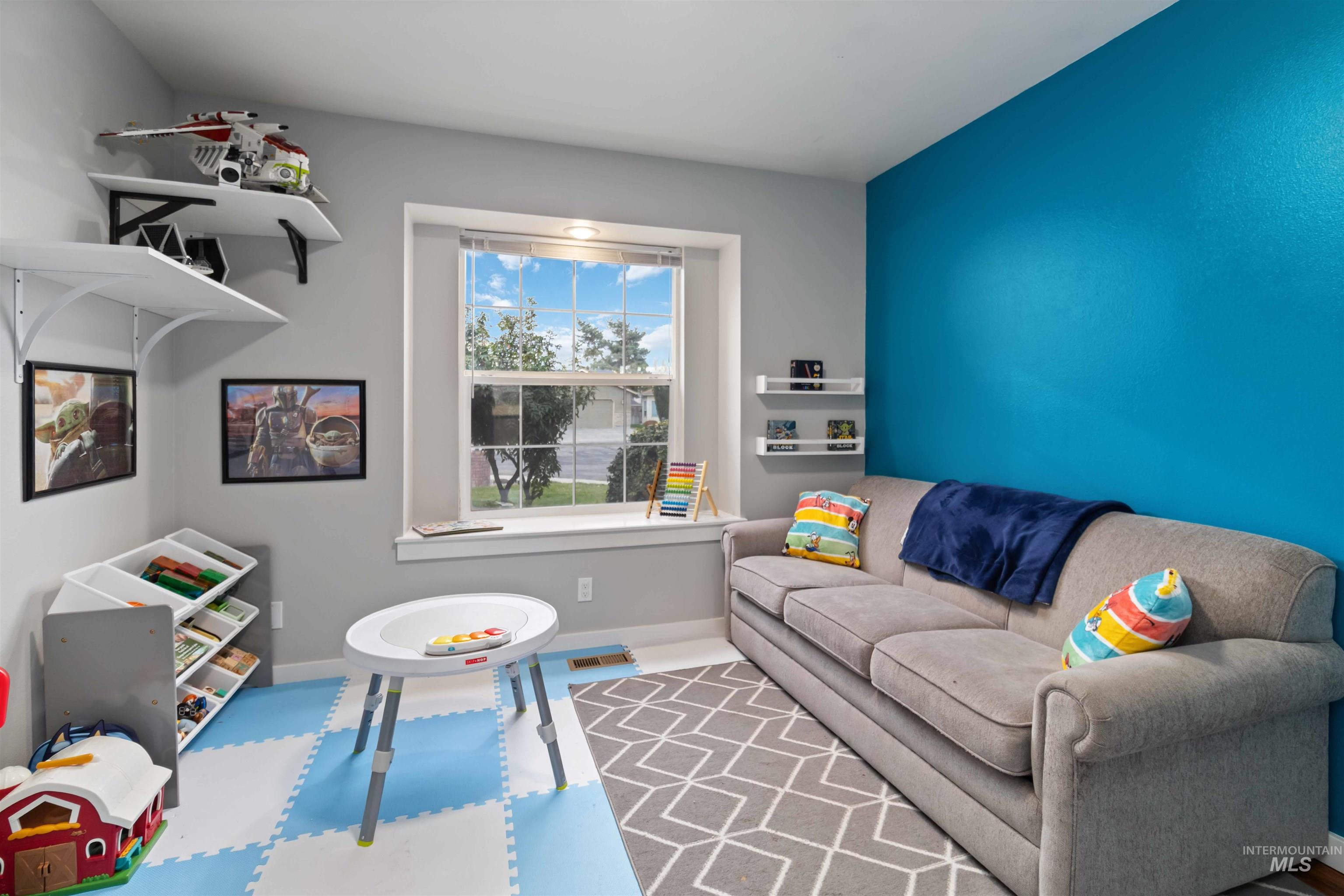 Rec room featuring baseboards