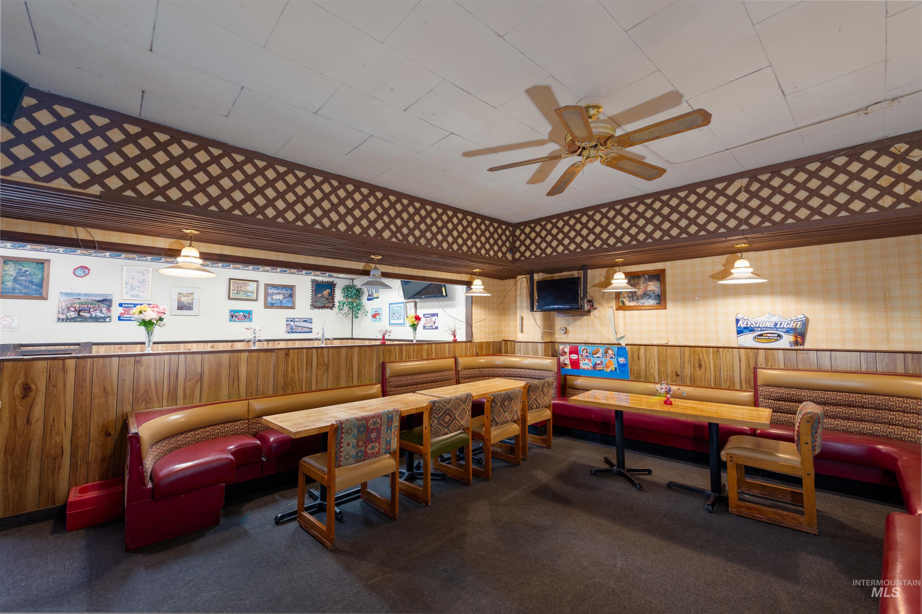 Lobby with wooden walls and a wainscoted wall