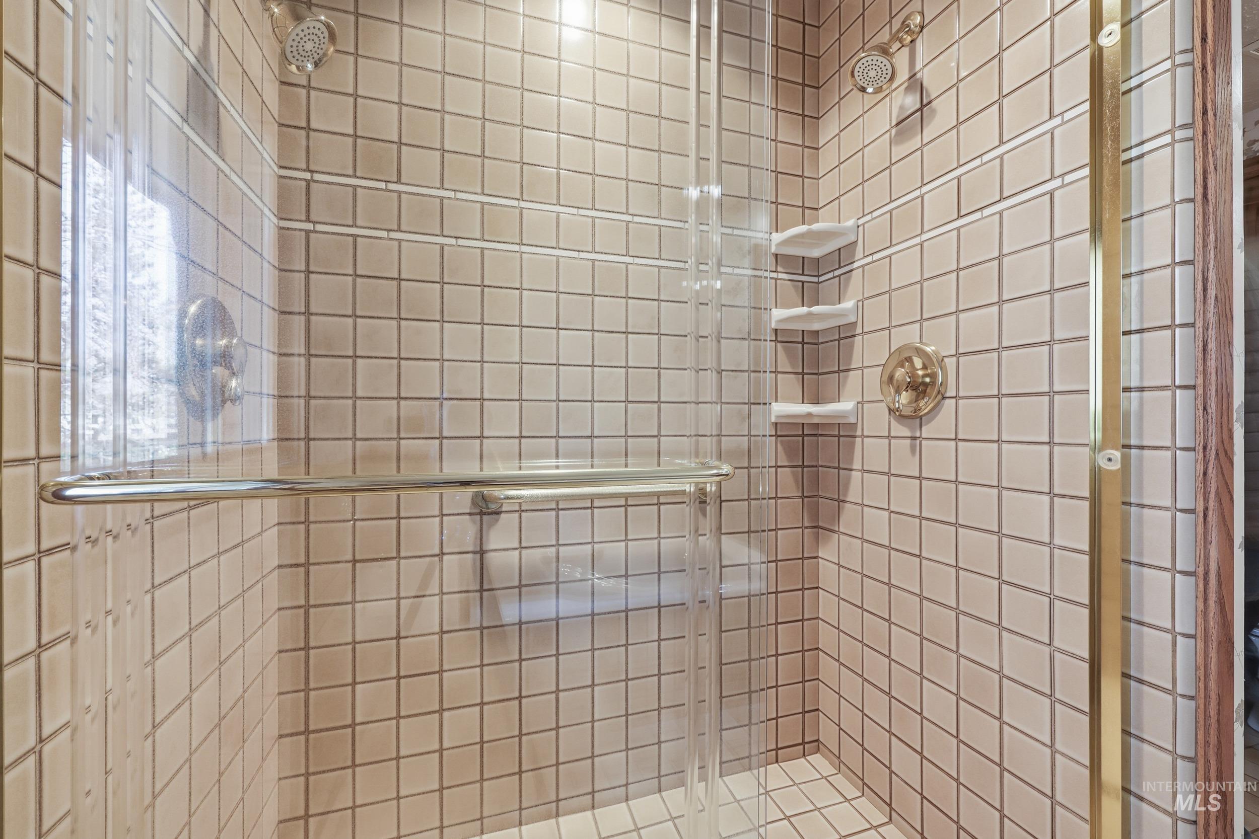 Bathroom with a tile shower