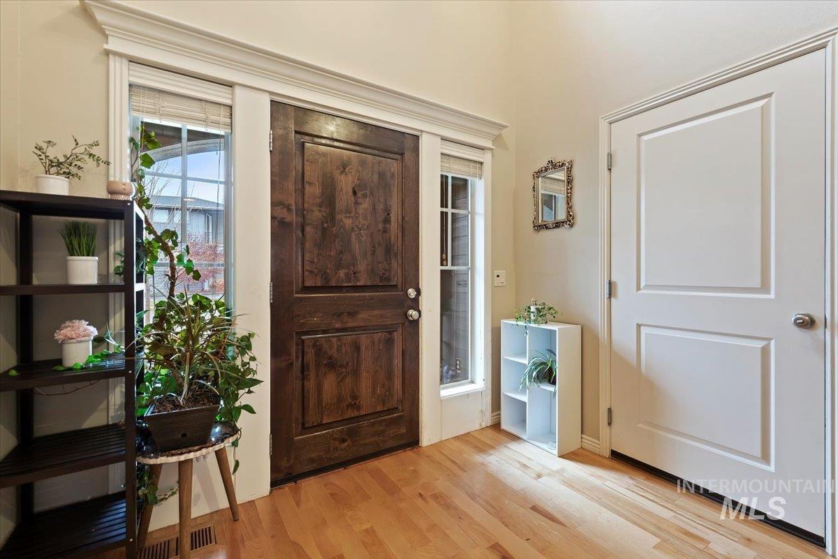 Foyer featuring light wood-type flooring