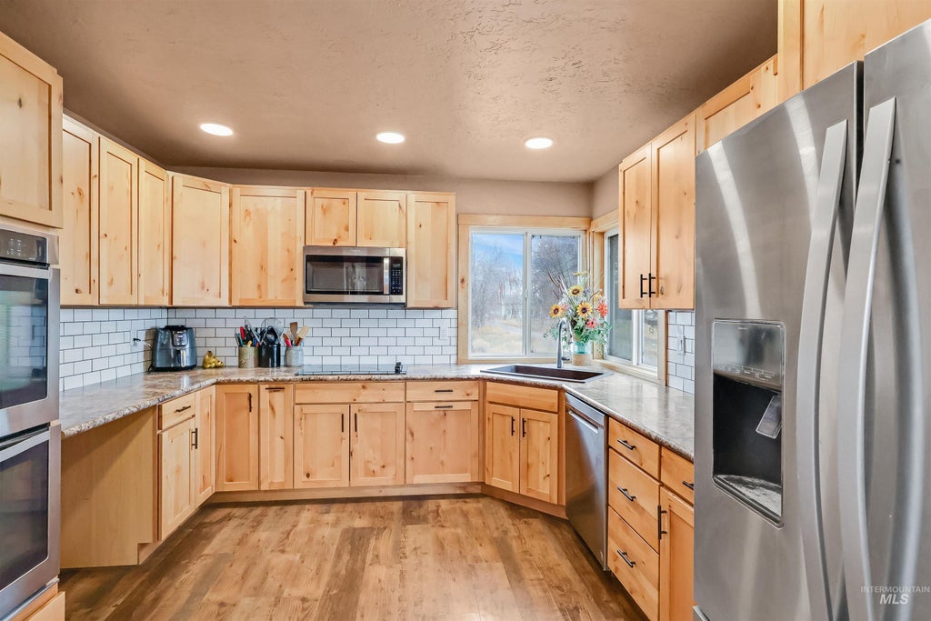 Photo of 136 S 100 W, Rupert, ID 83350 (MLS # 99000837)