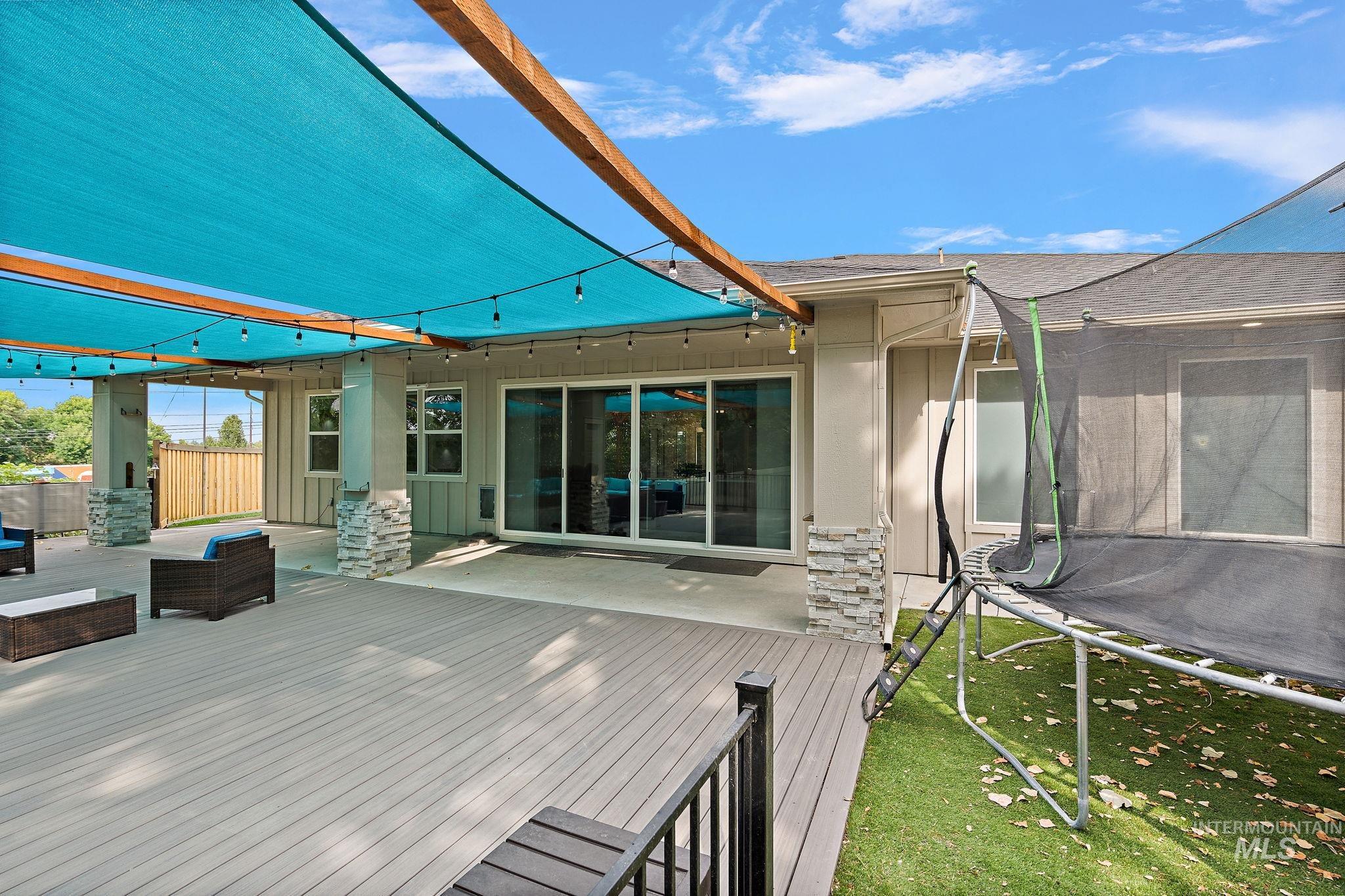 Wooden deck with a trampoline