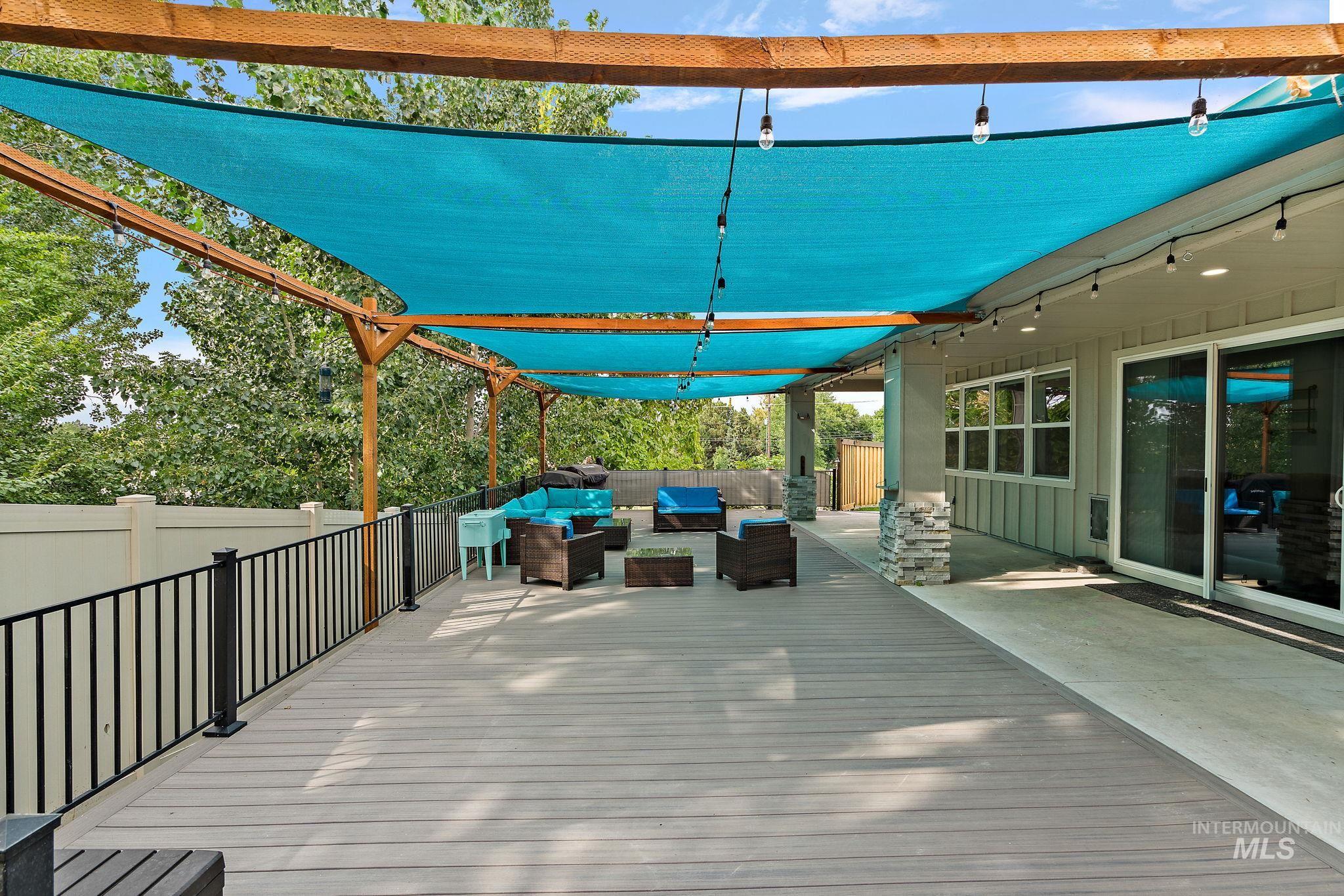 Wooden deck with an outdoor hangout area