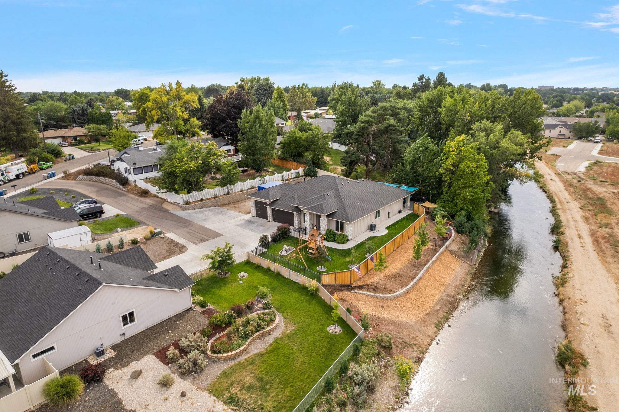 Aerial view of residential area with a large body of water