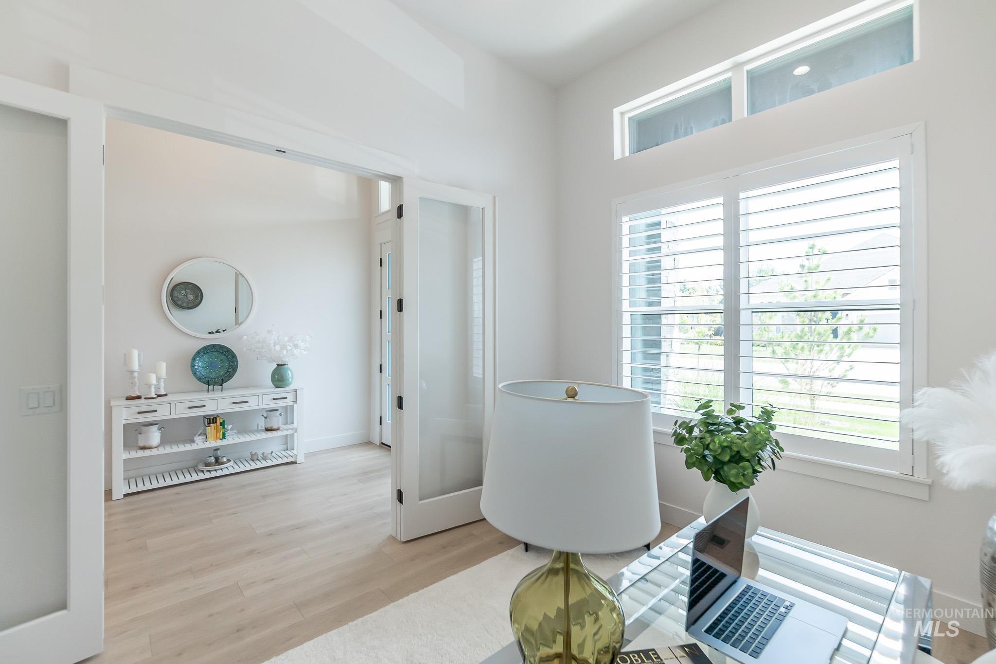 Office featuring wood finished floors and plenty of natural light