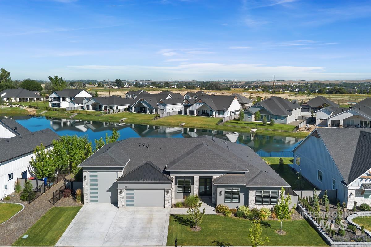 Aerial view of residential area with a nearby body of water